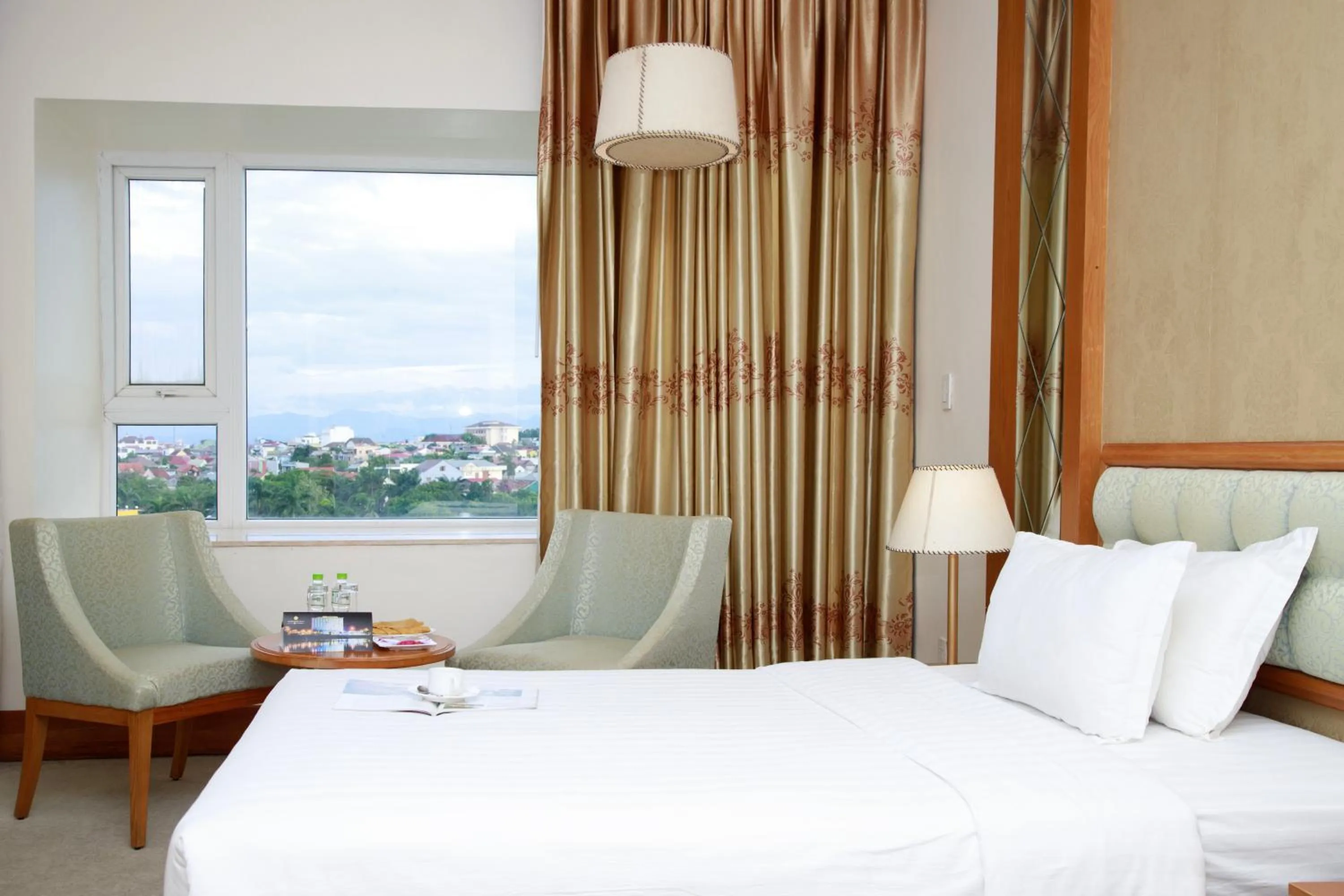 Bed in Sai Gon Dong Ha Hotel - a member of Saigontourist Group