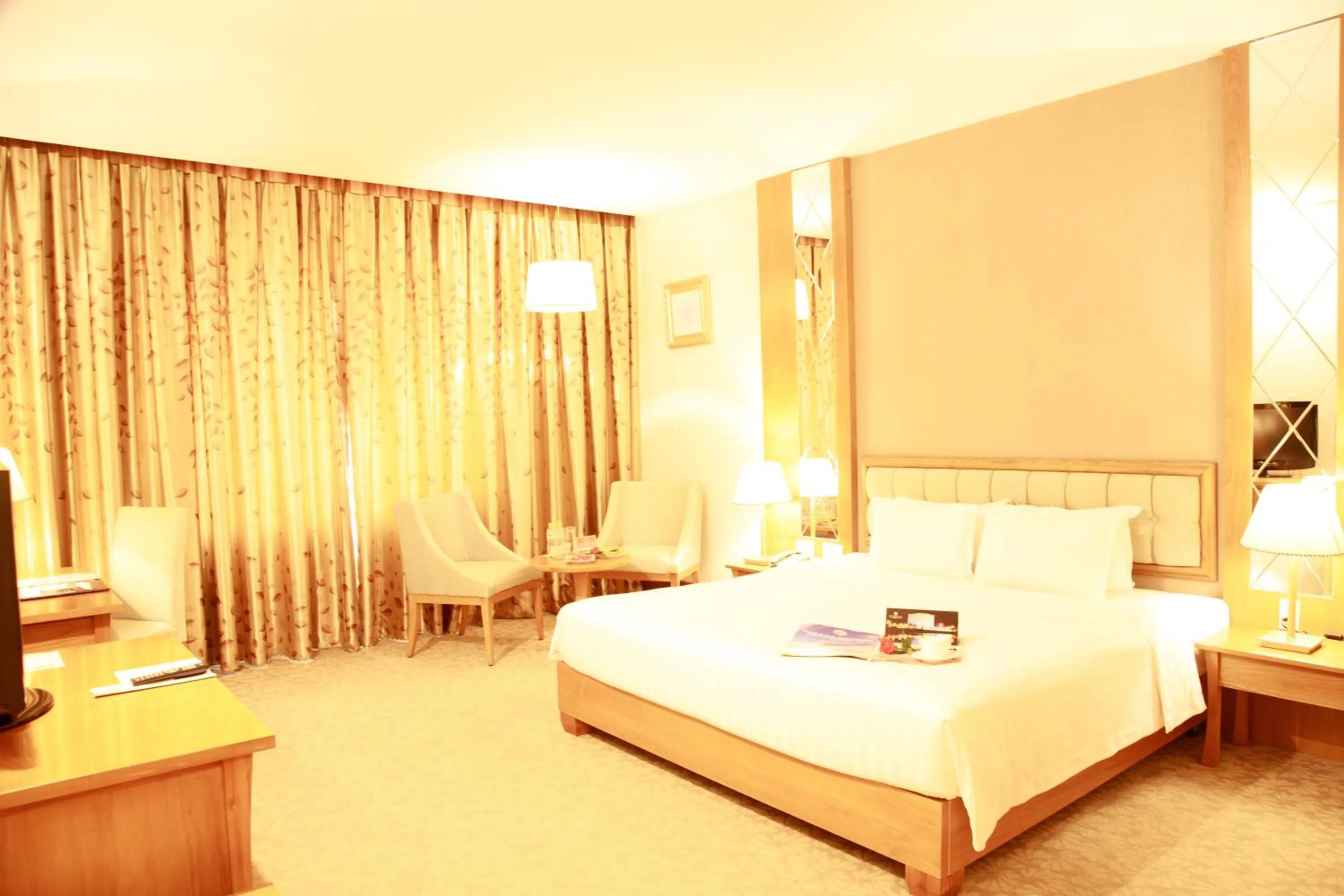 Bed in Sai Gon Dong Ha Hotel - a member of Saigontourist Group