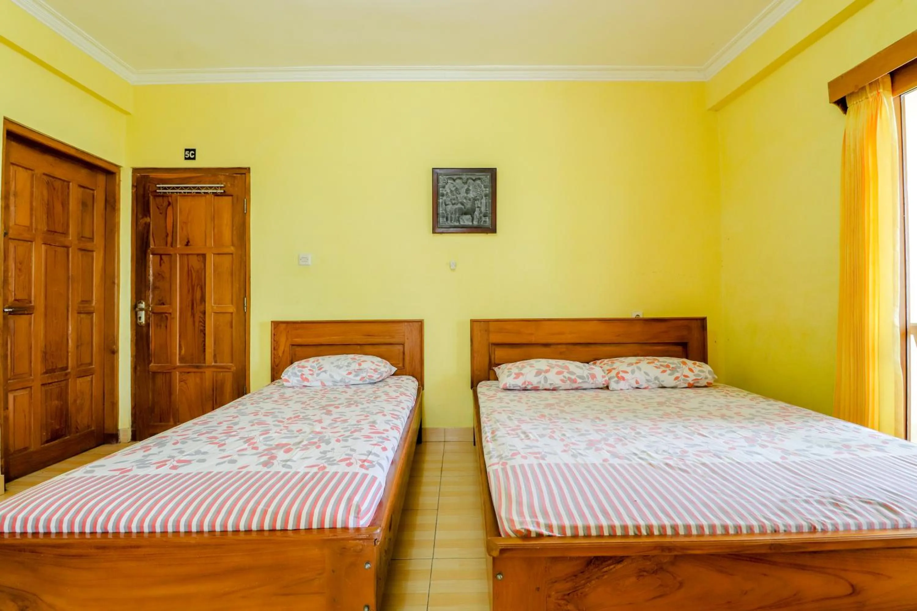 Bedroom, Bed in Adinda Beach Hotel and Villa