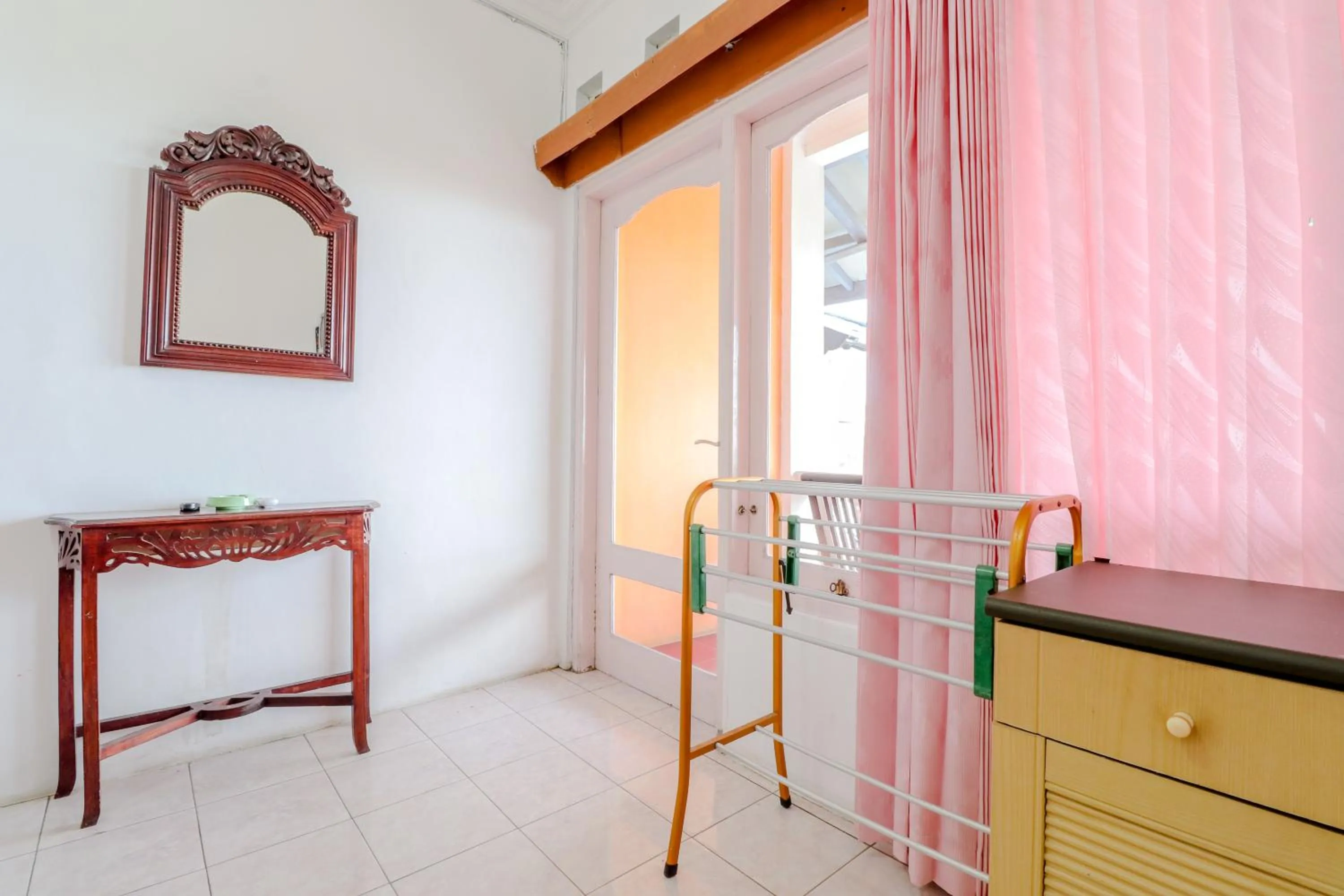 Bedroom in Adinda Beach Hotel and Villa