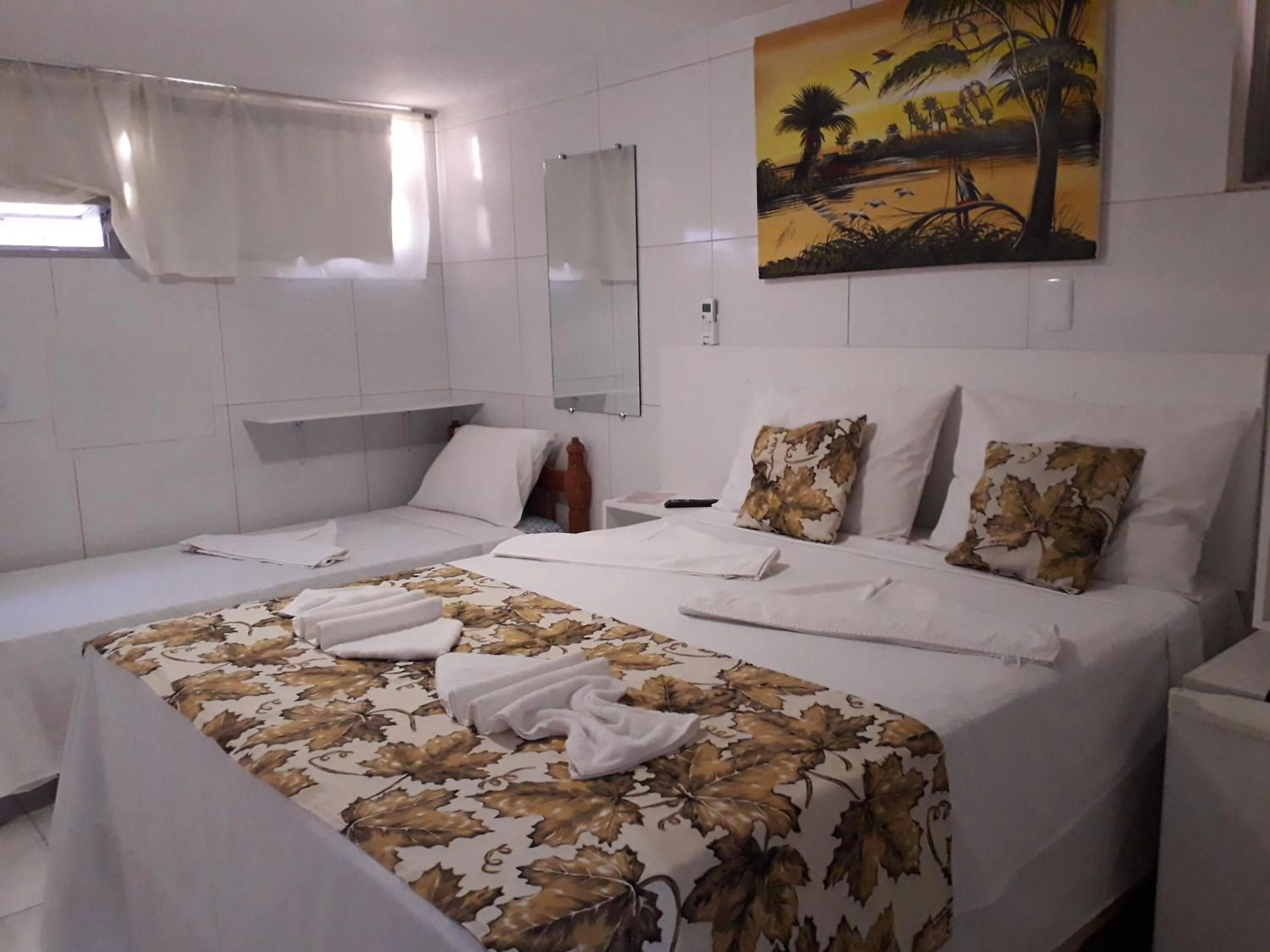 Bed in Pousada Recanto do Sol e Mar