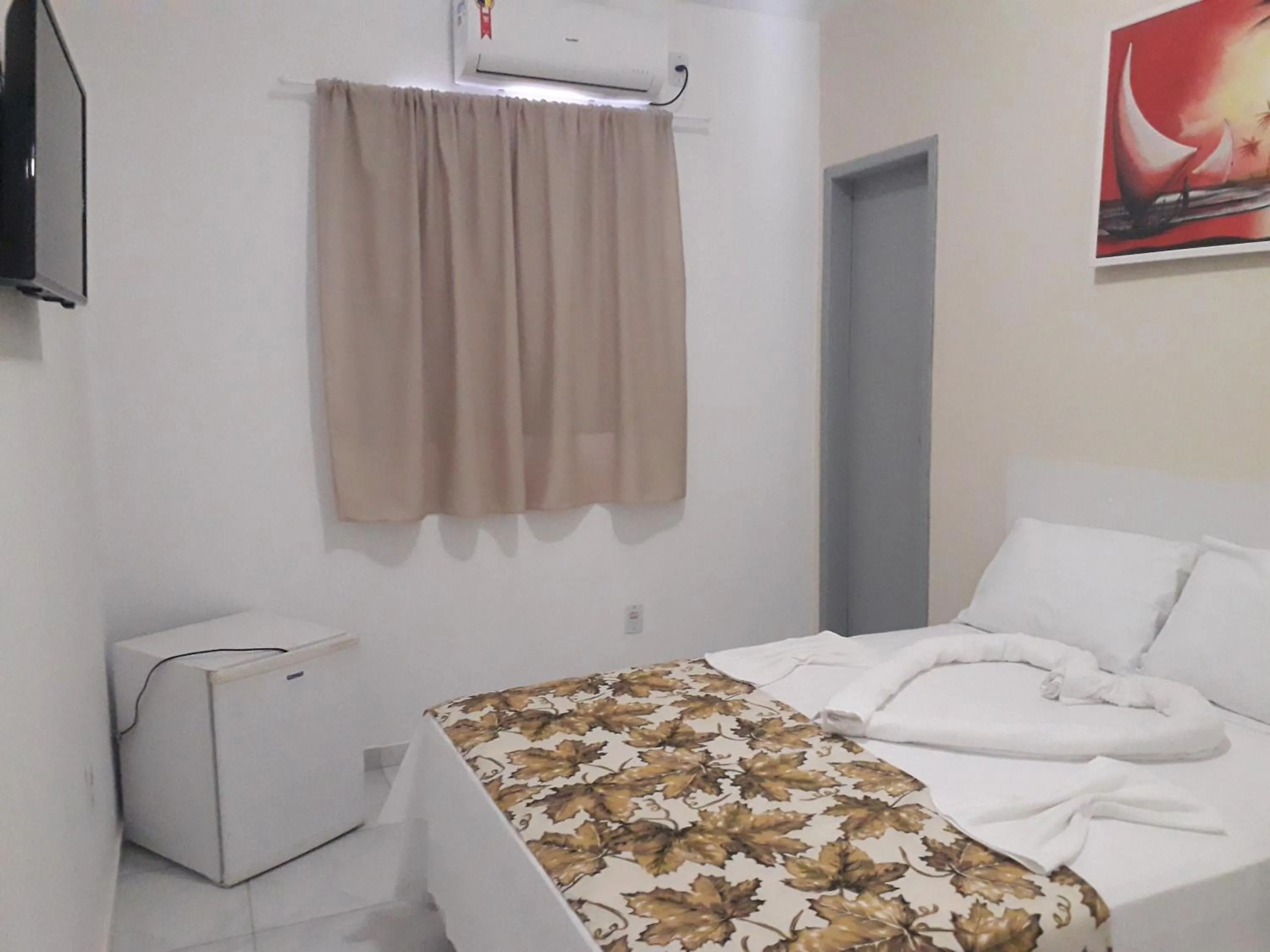 Bed in Pousada Recanto do Sol e Mar