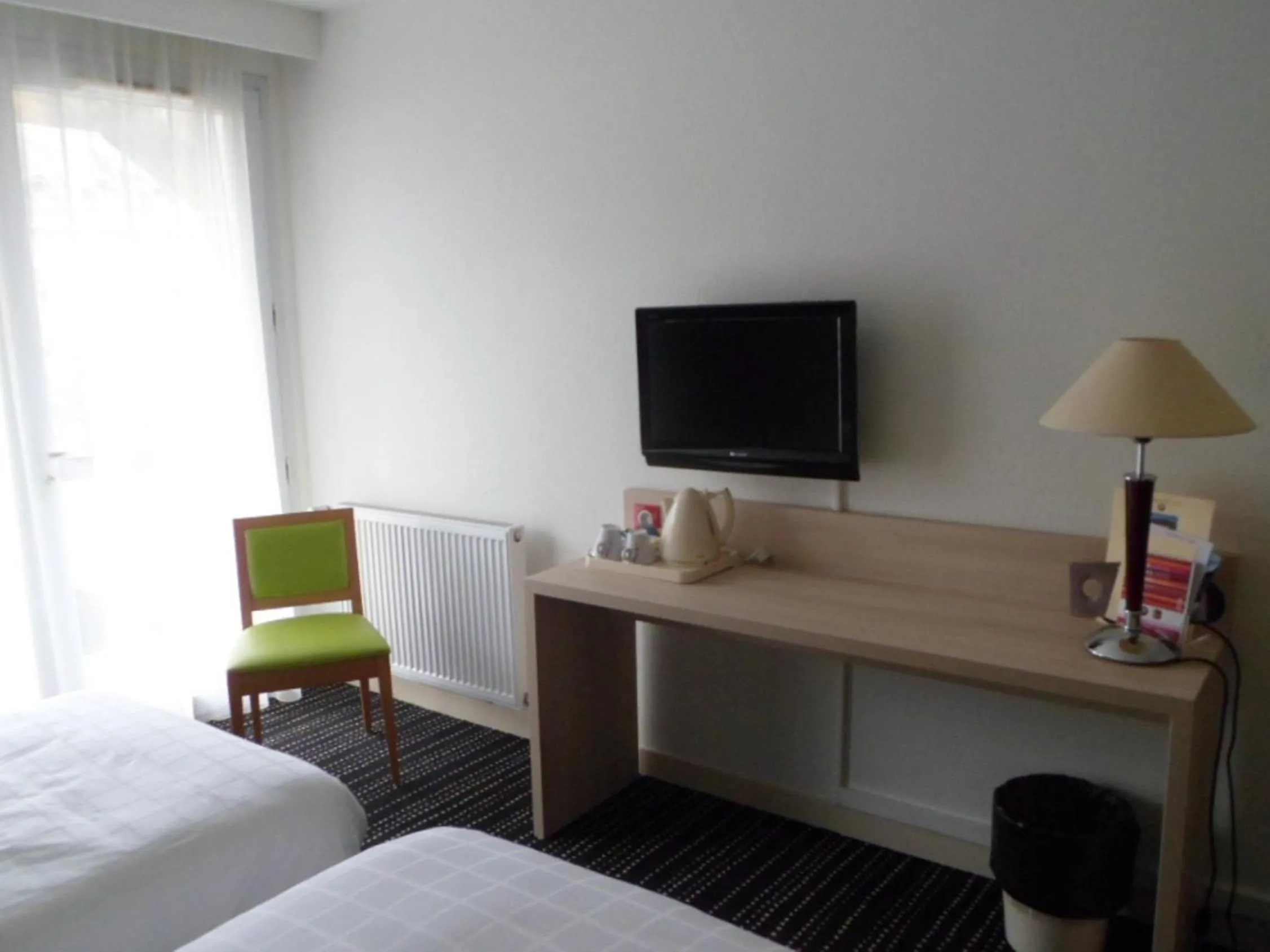 TV and multimedia, Bed in BRIT HOTEL Confort Le Limouzi TULLE