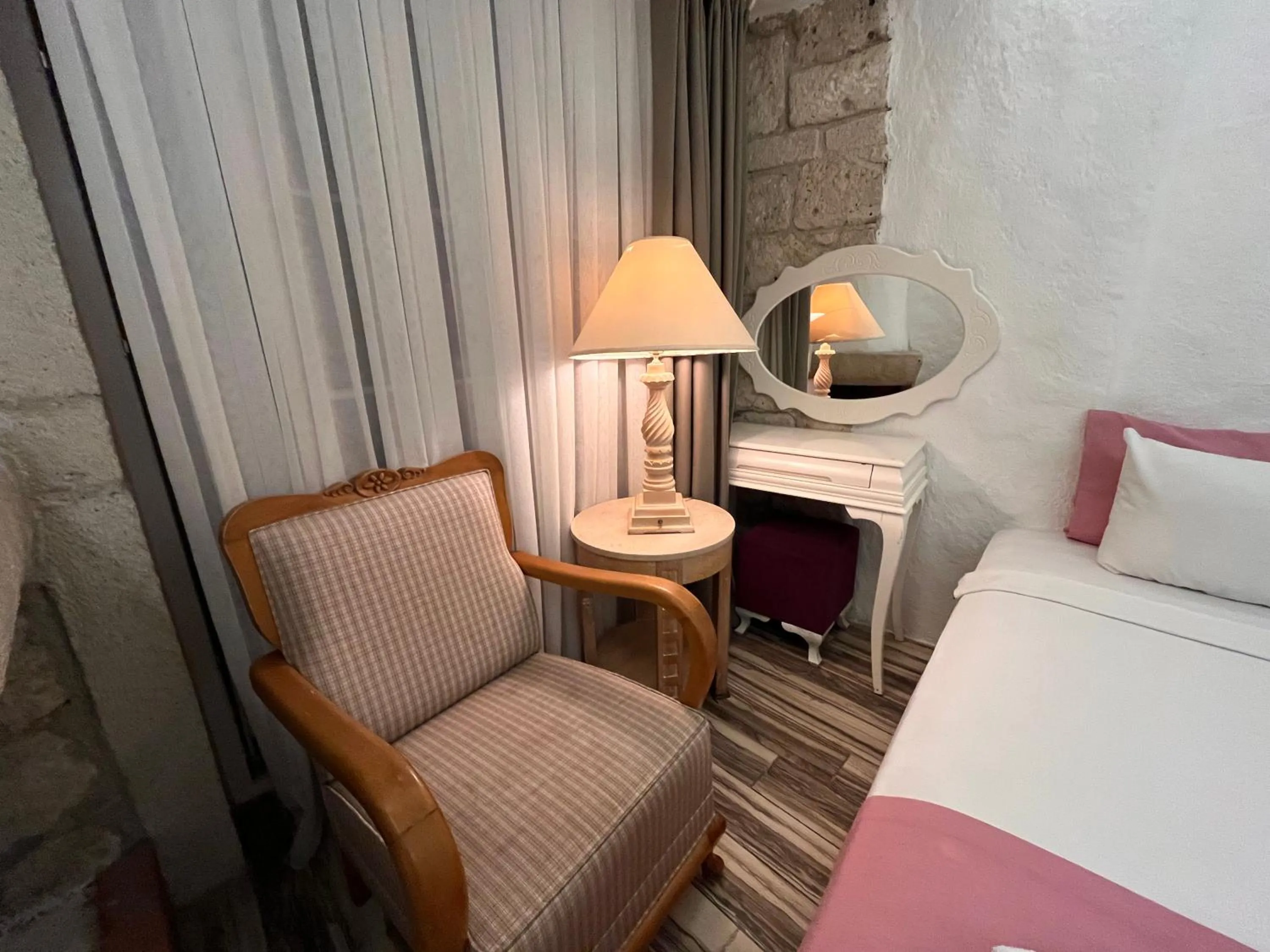 Seating area, Bed in Alacati Asmali Konak Hotel