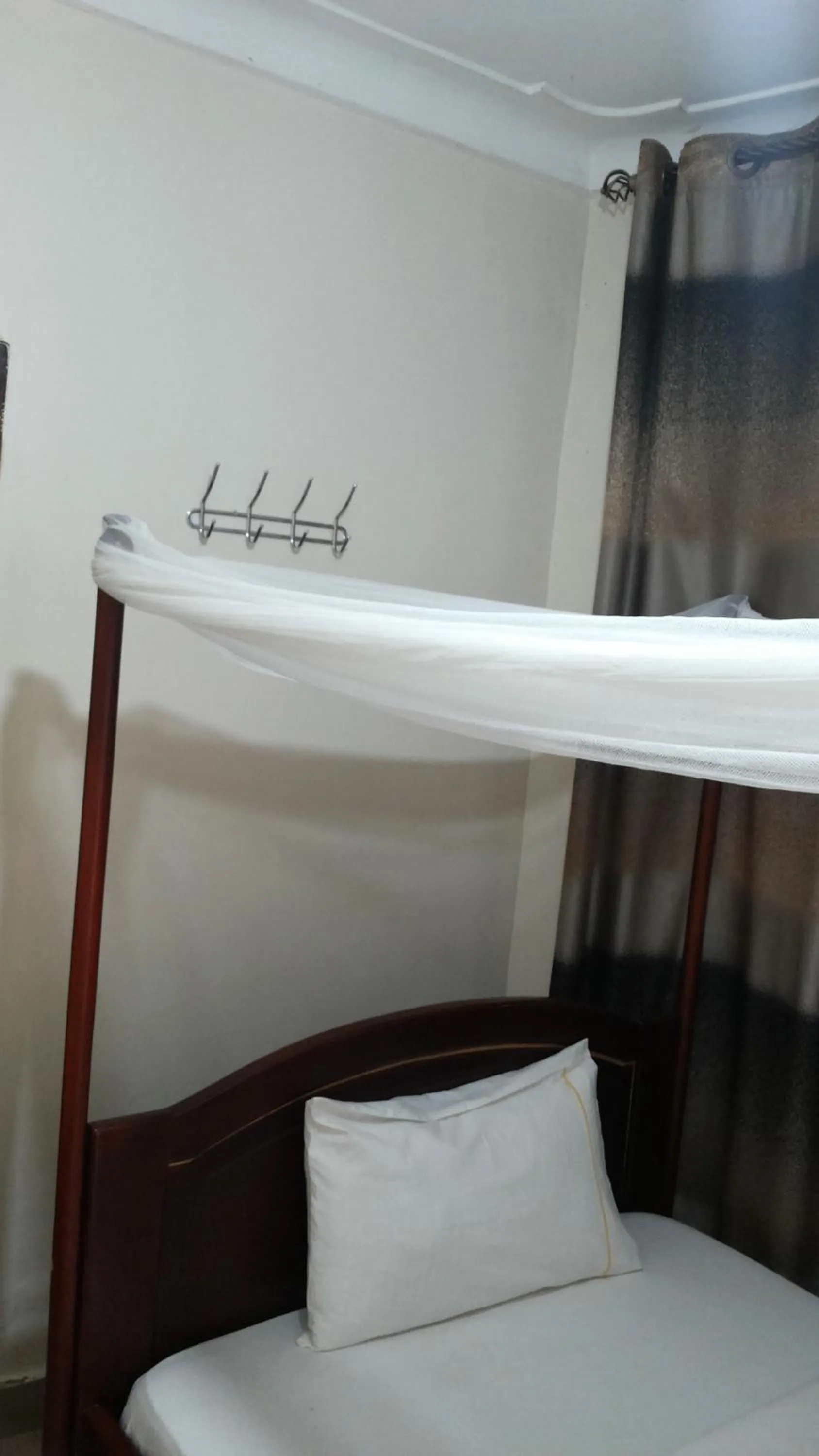 Bedroom in Kalalo Cottage Inn