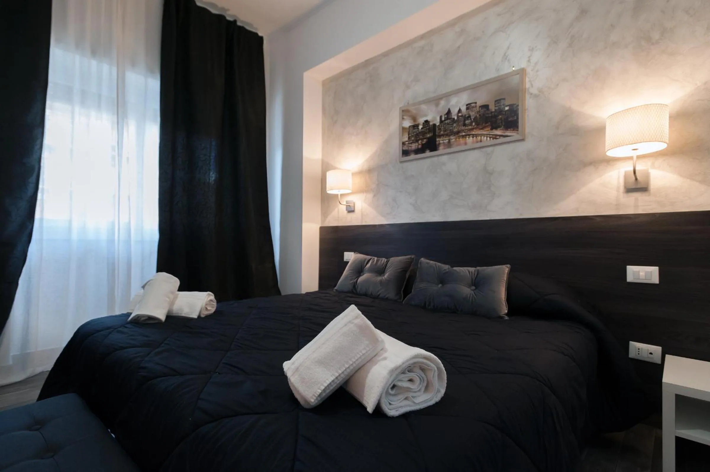 Bedroom in TIBURTINA INN GUEST HOUSE