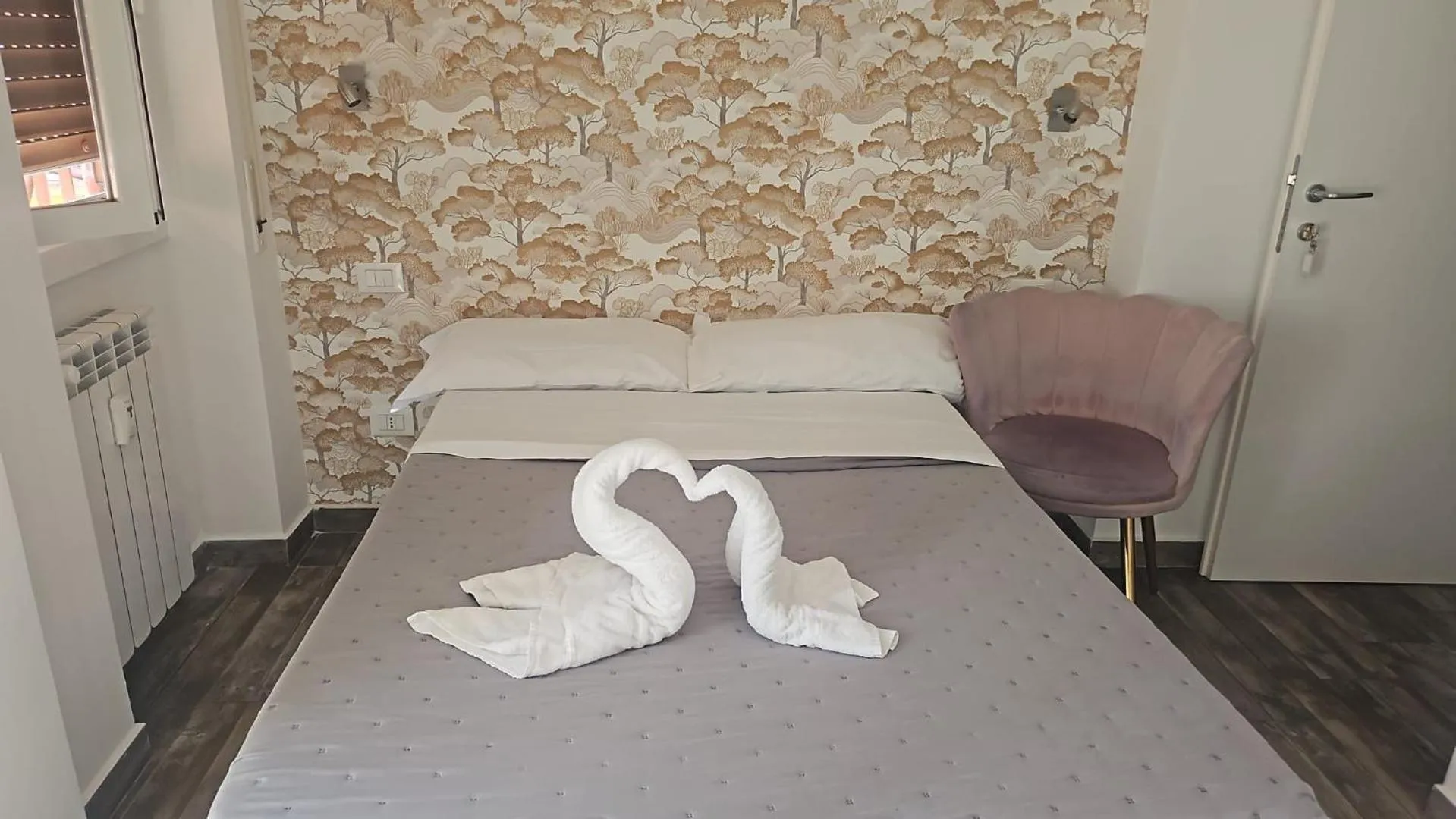 Bed in TIBURTINA INN GUEST HOUSE