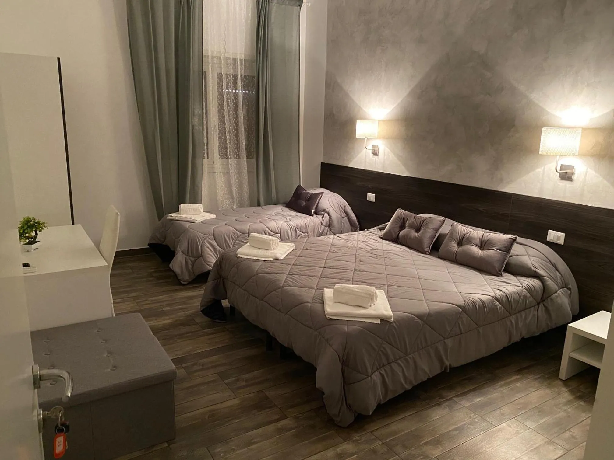 Bedroom in TIBURTINA INN GUEST HOUSE