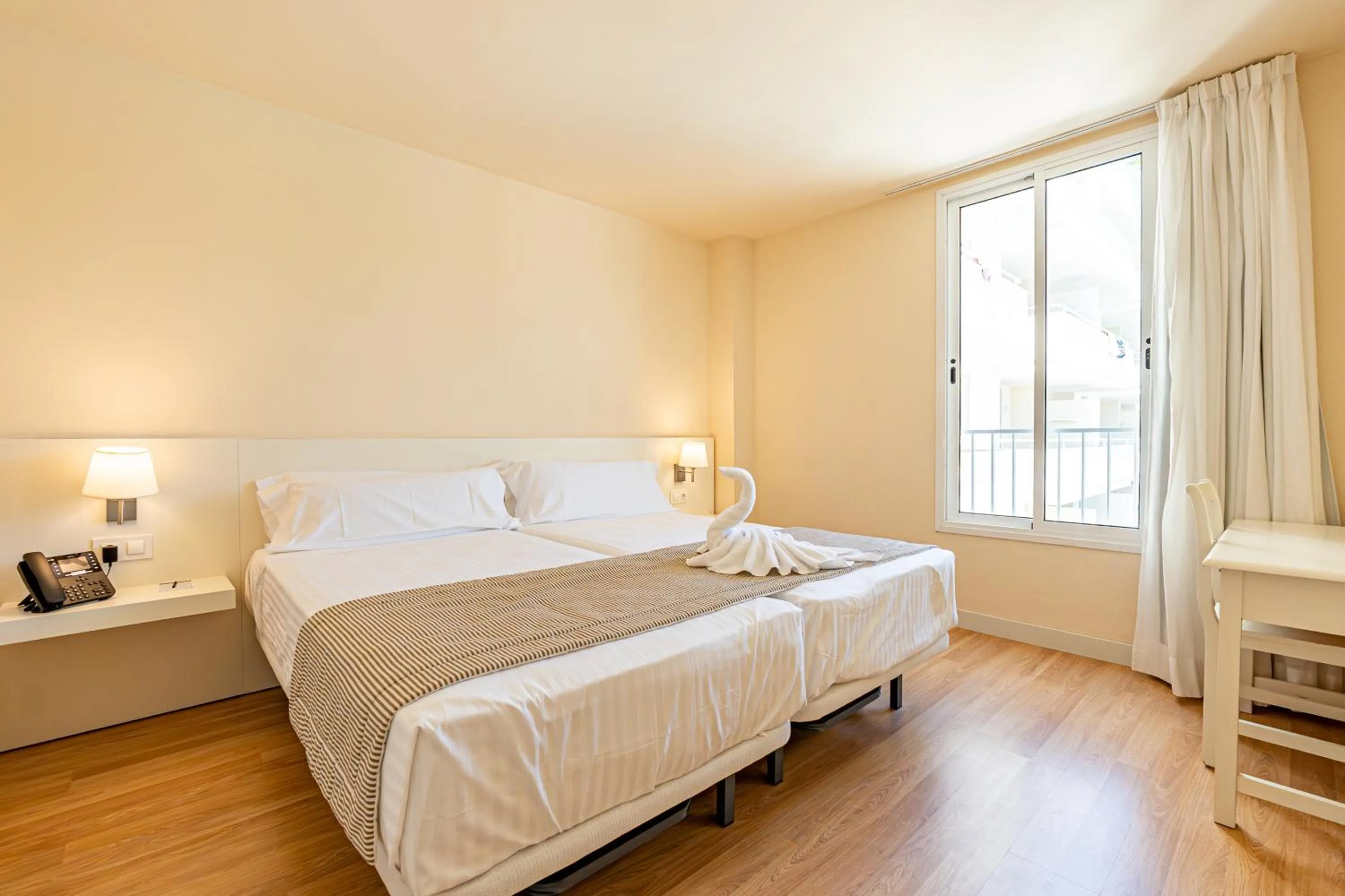 Bedroom, Bed in Hotel Rosella affiliated by Intelier