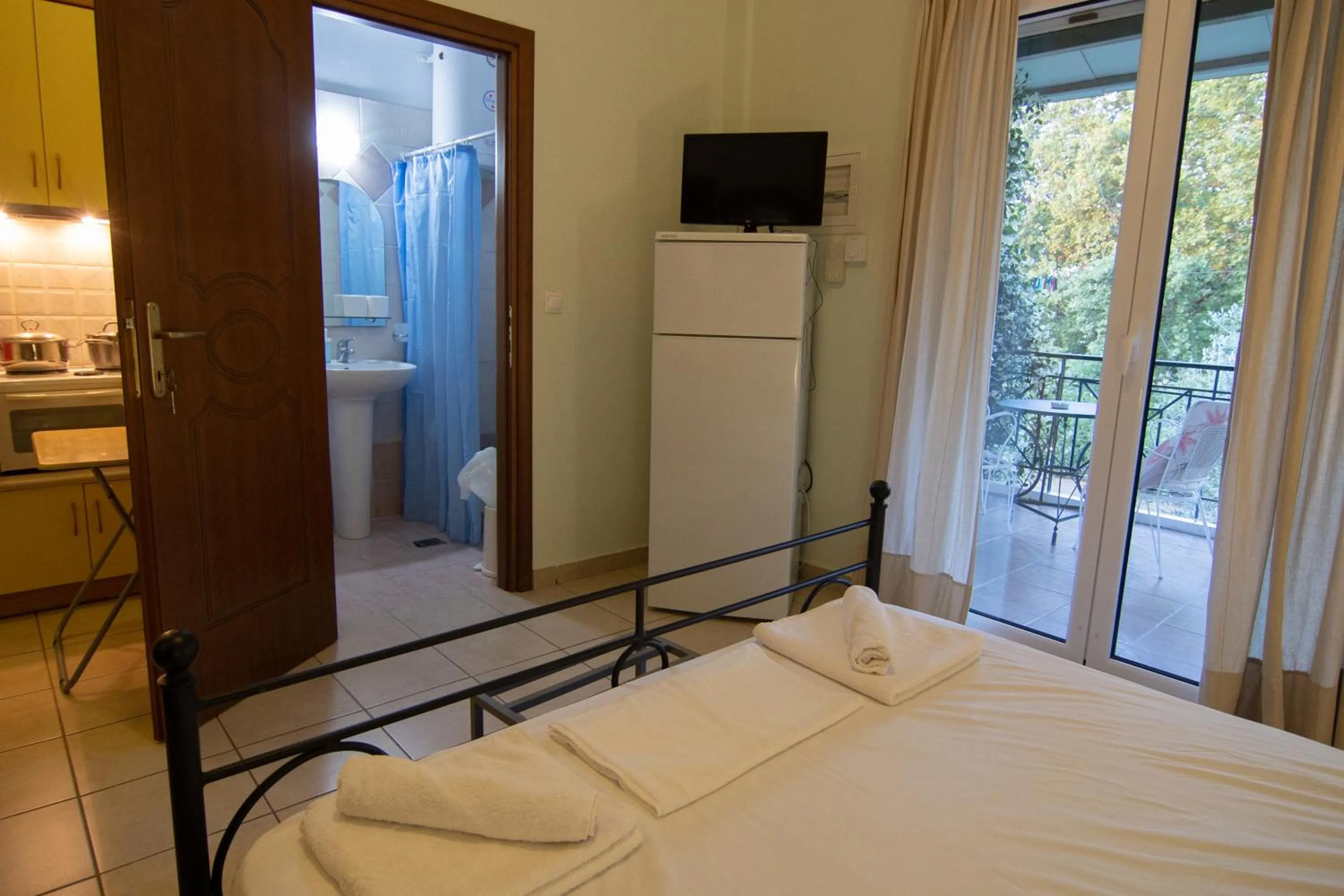 Bed in Tsertos Apartments