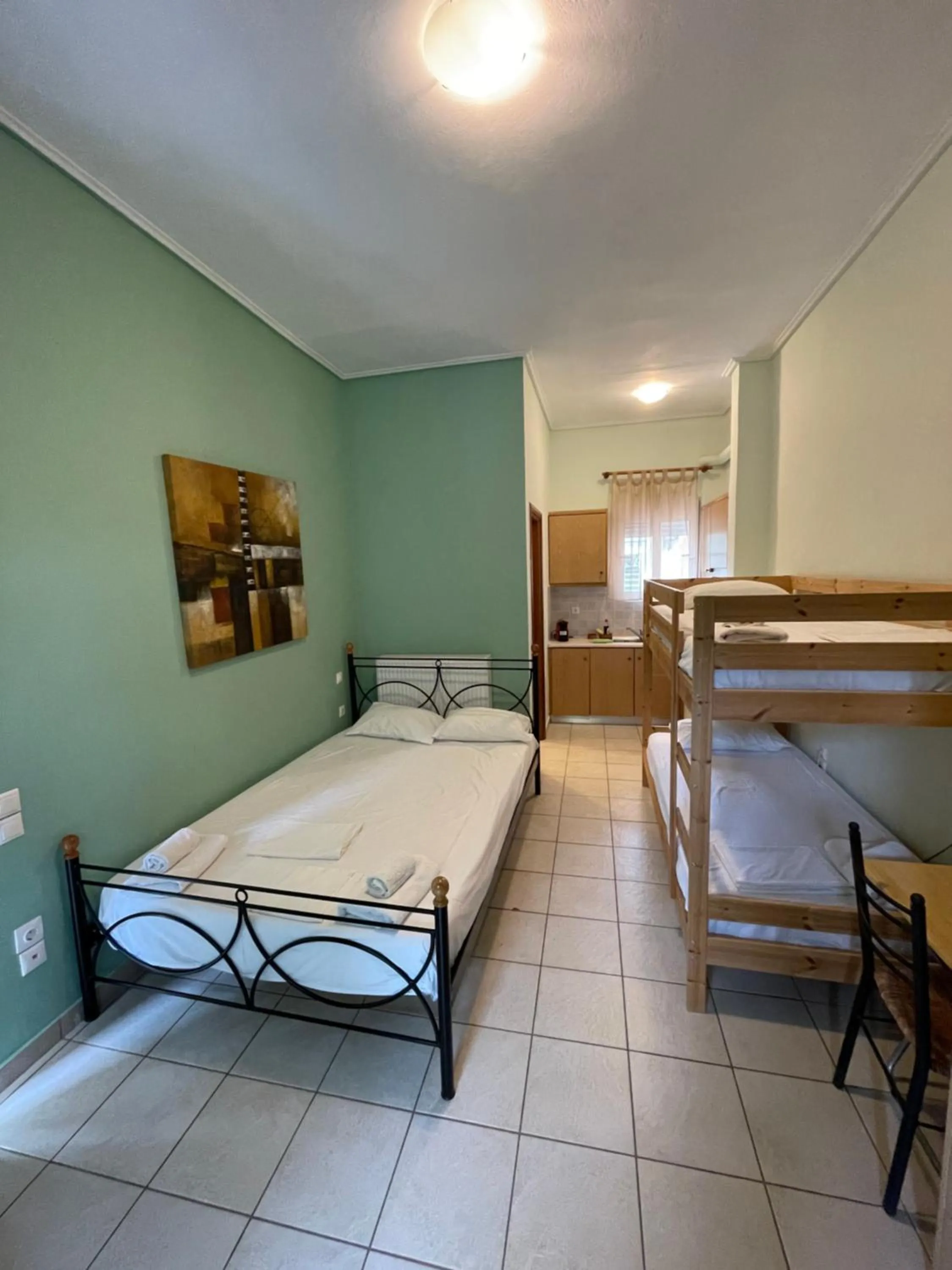 Bed in Tsertos Apartments