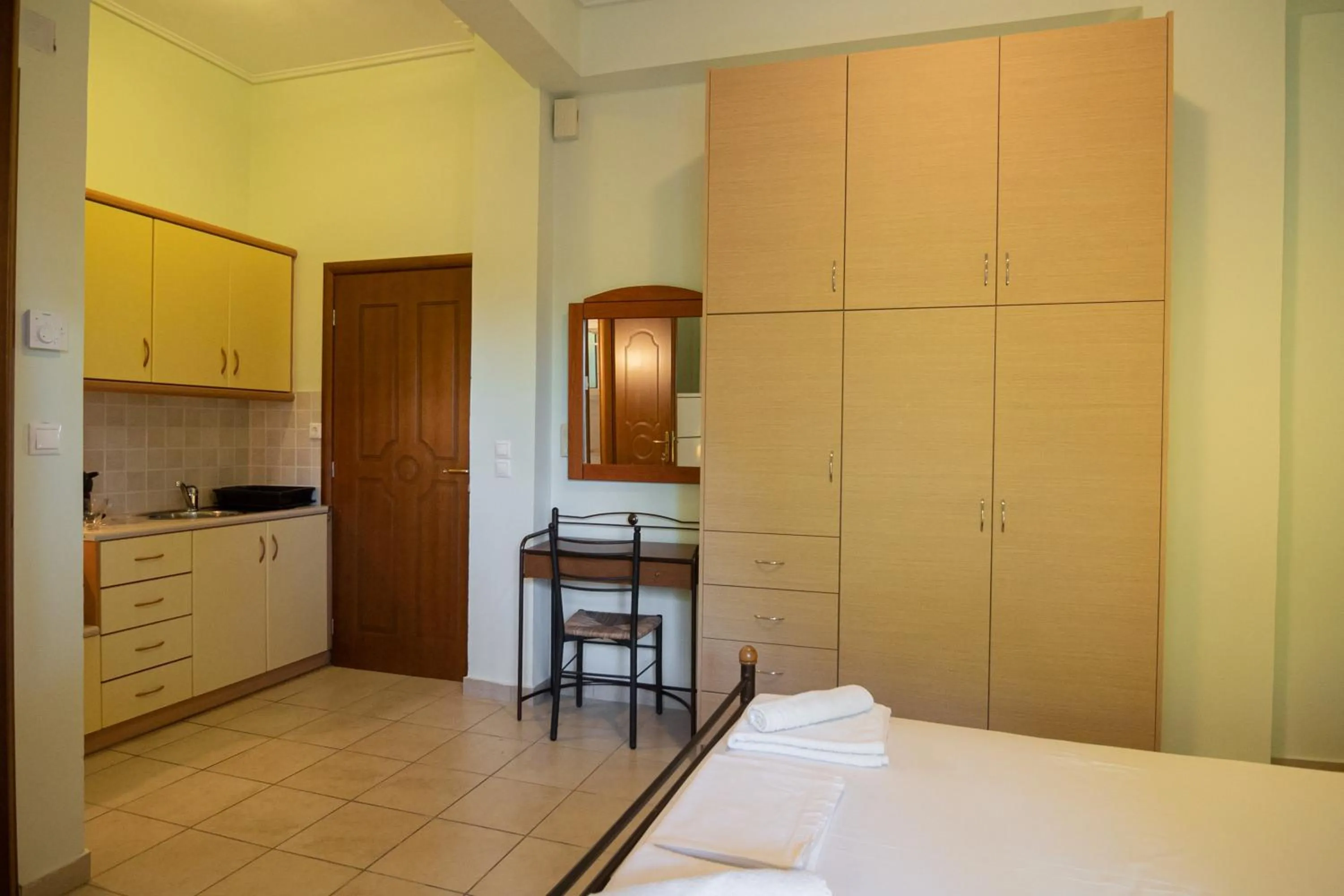 Bed in Tsertos Apartments