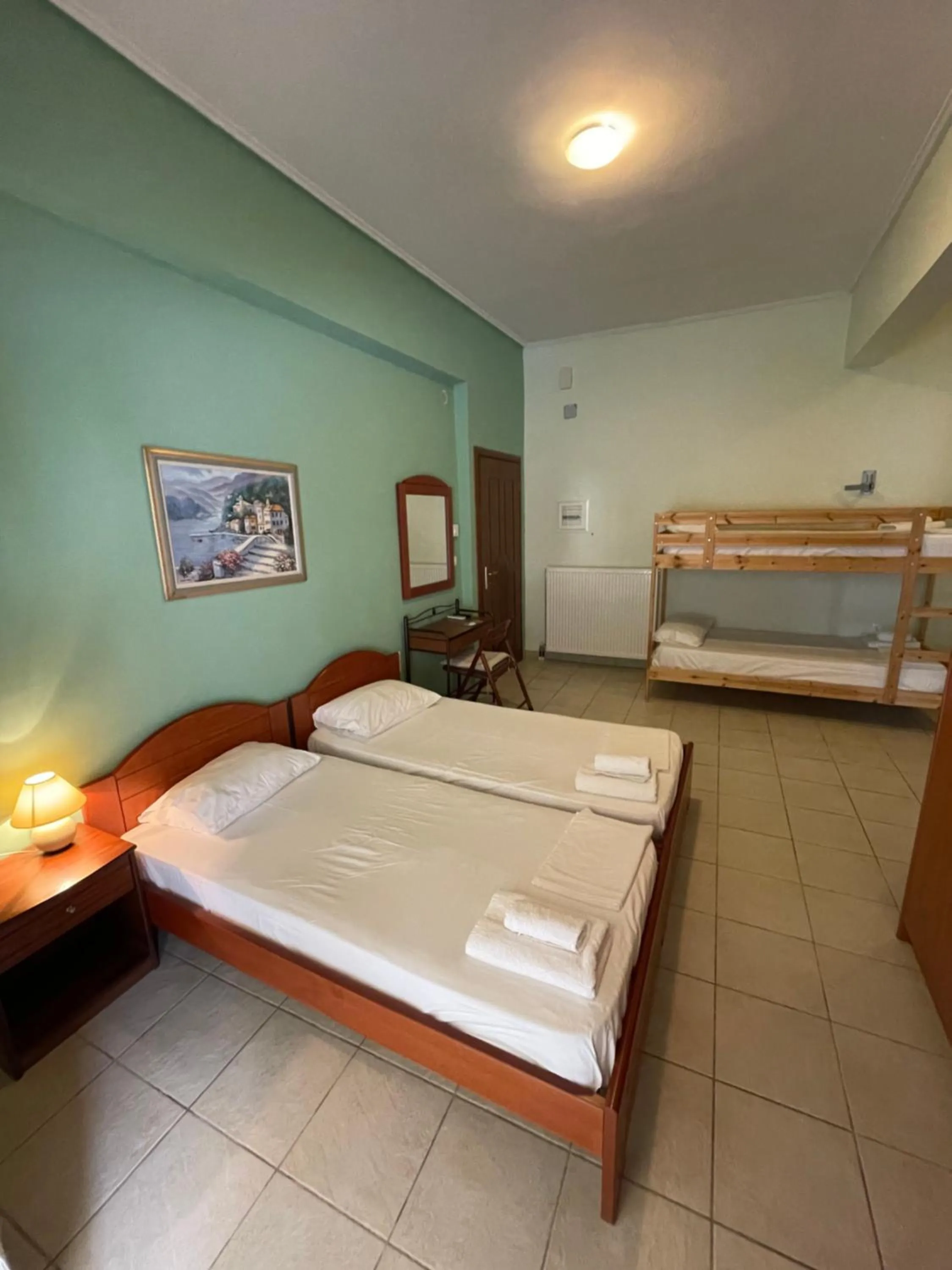 Bed in Tsertos Apartments