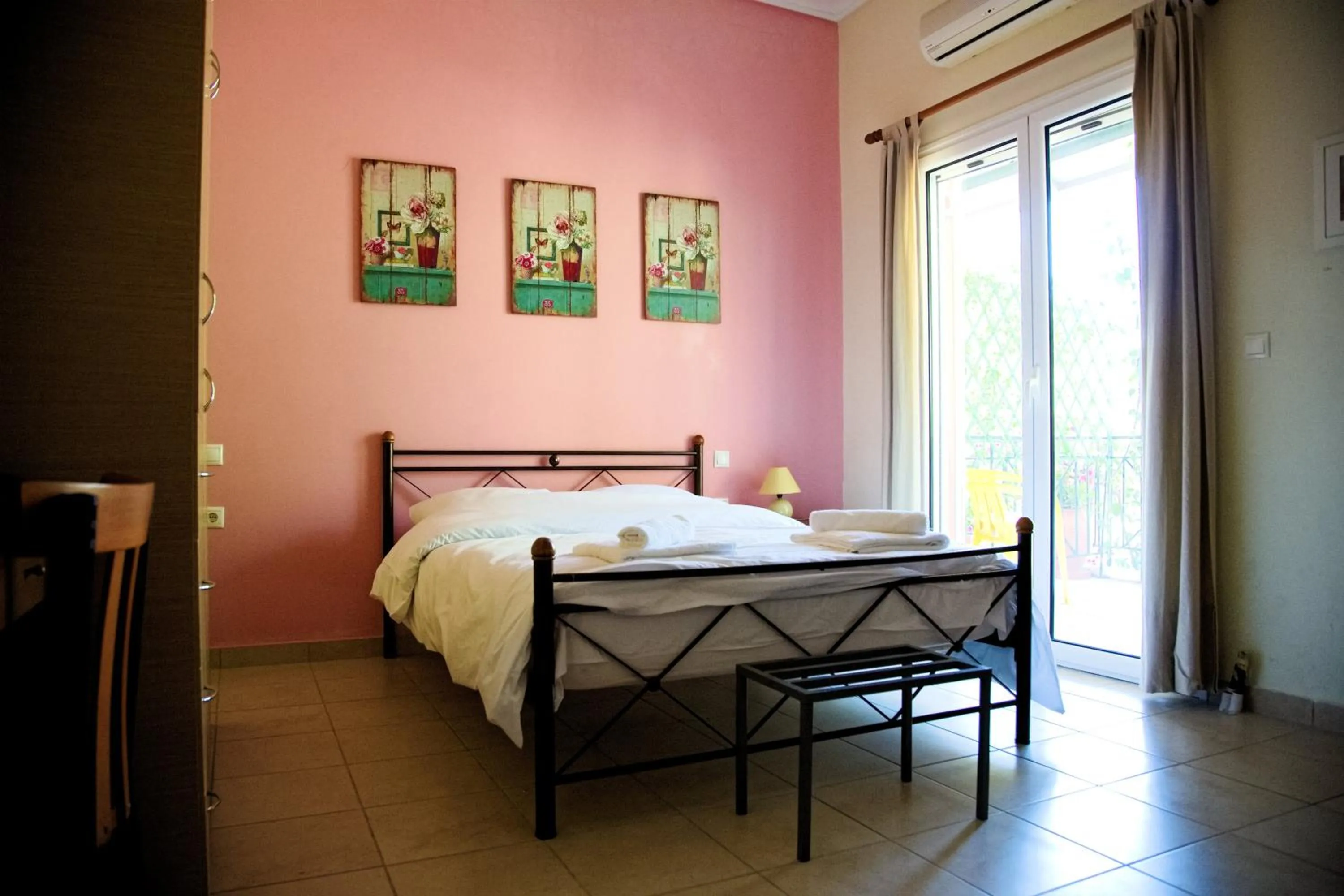 Bed in Tsertos Apartments