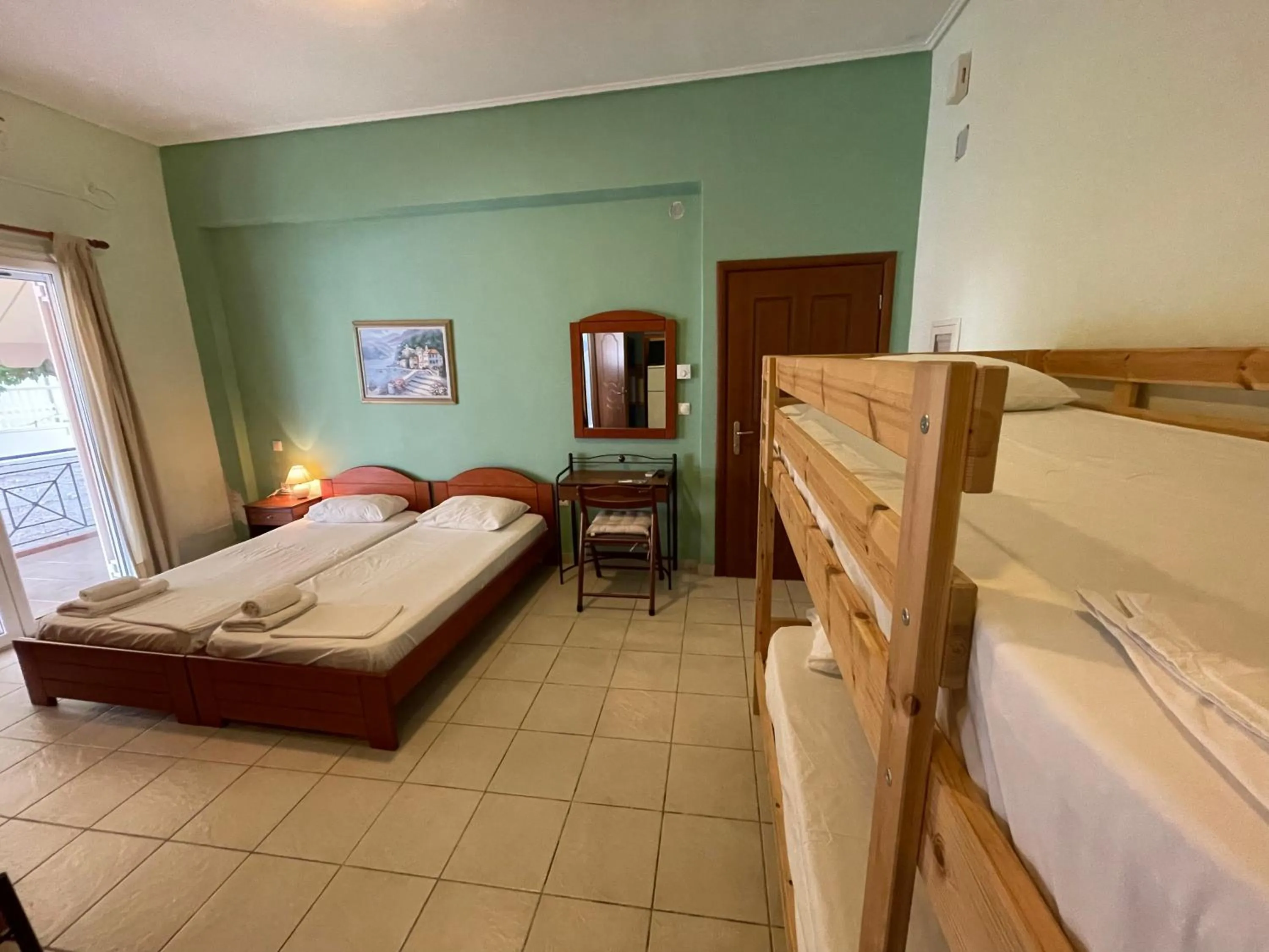 Bed in Tsertos Apartments