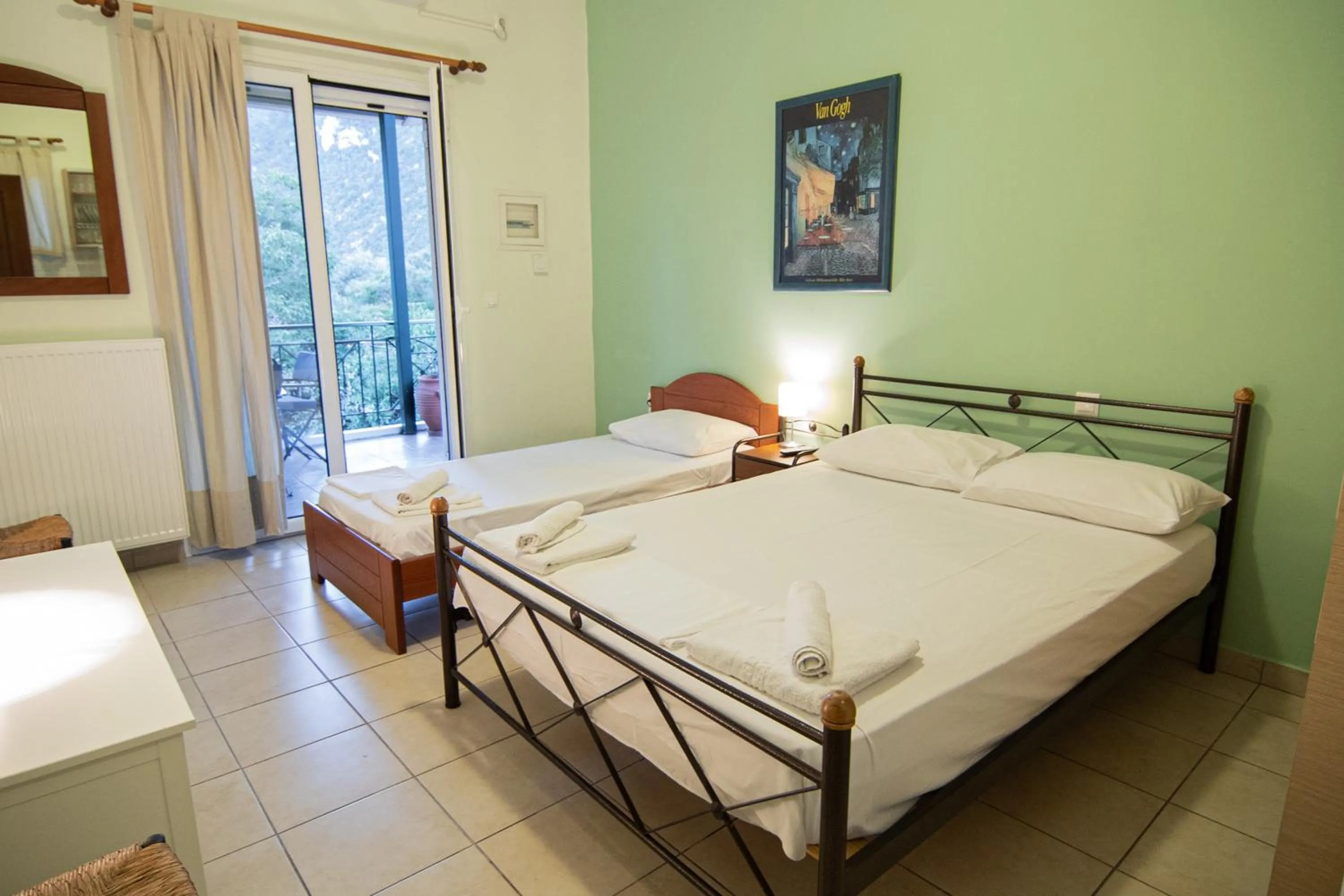 Bed in Tsertos Apartments