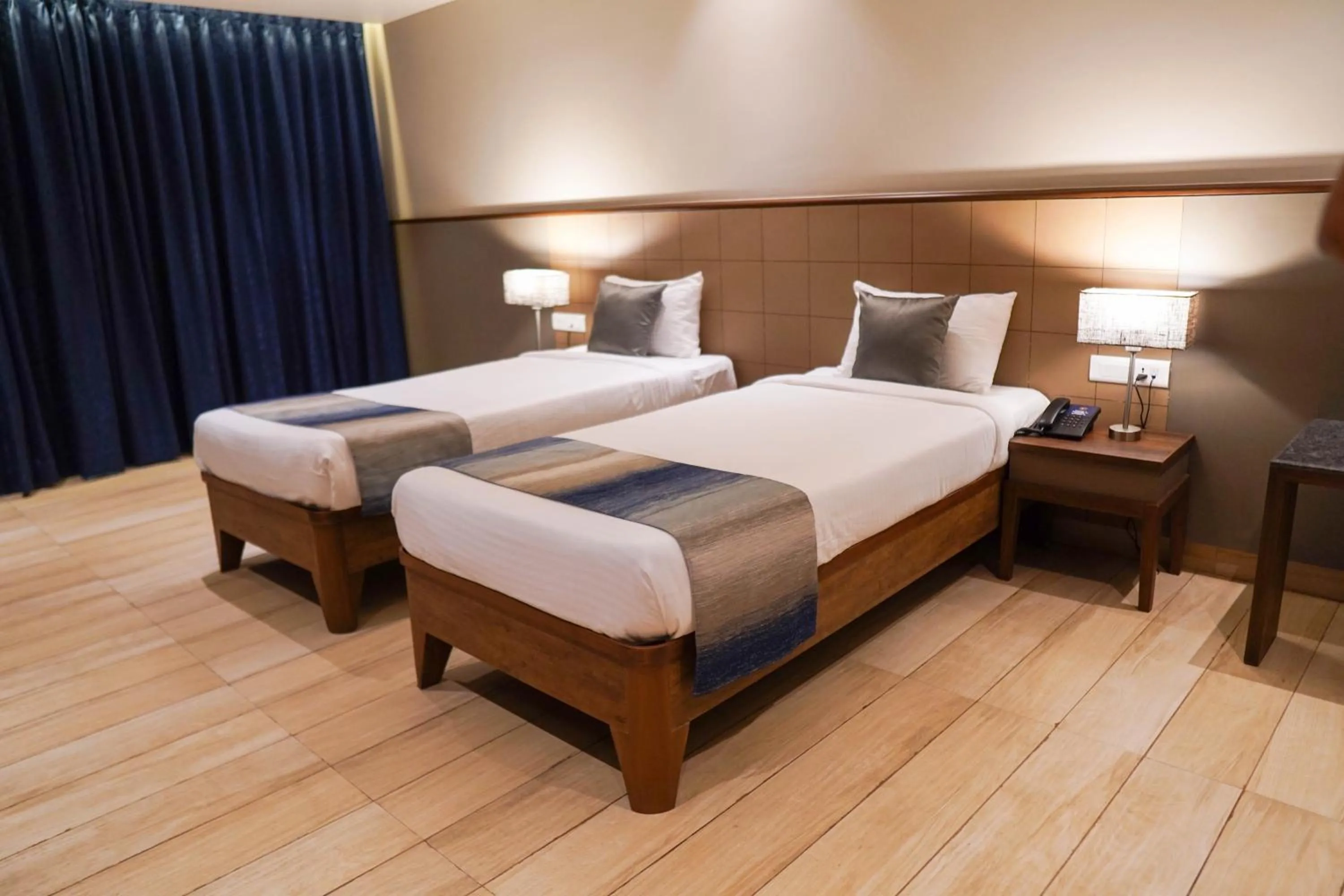 Photo of the whole room, Bed in Cosmique Clarks Inn Suites Goa