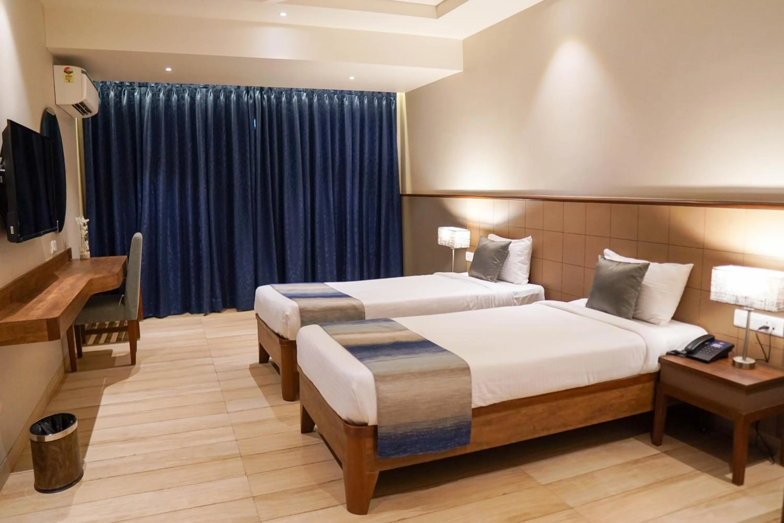 Photo of the whole room, Bed in Cosmique Clarks Inn Suites Goa