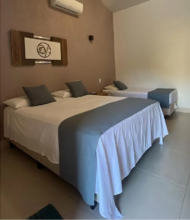 Bed in Pousada do Rio Turvo