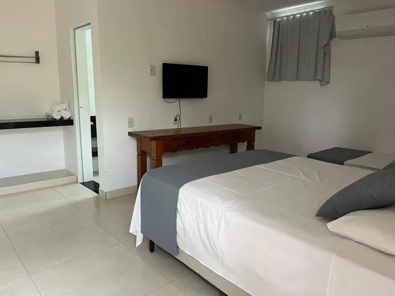 Bed in Pousada do Rio Turvo