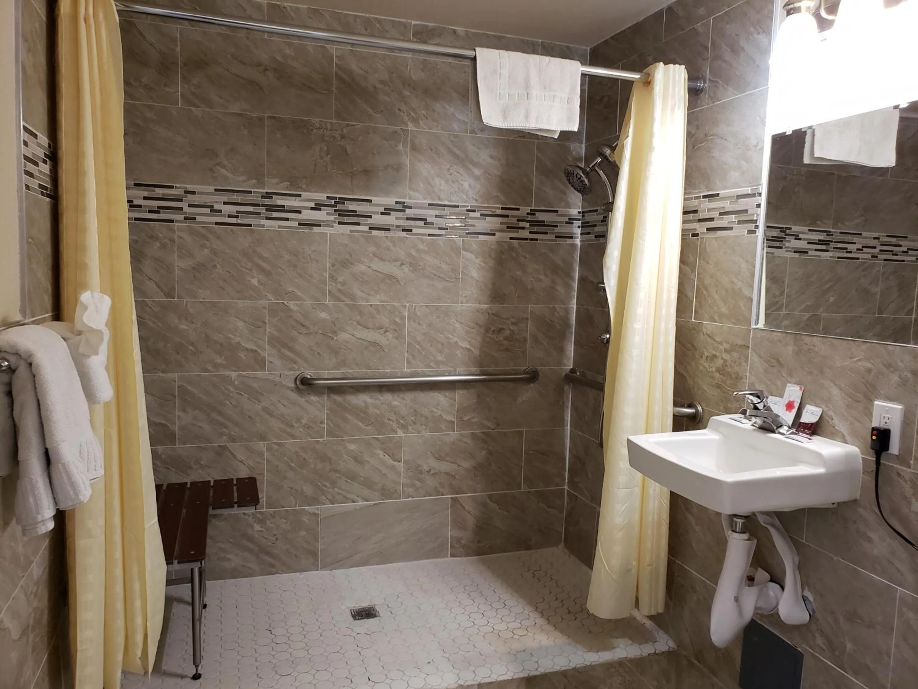 Bathroom in California Suites Motel