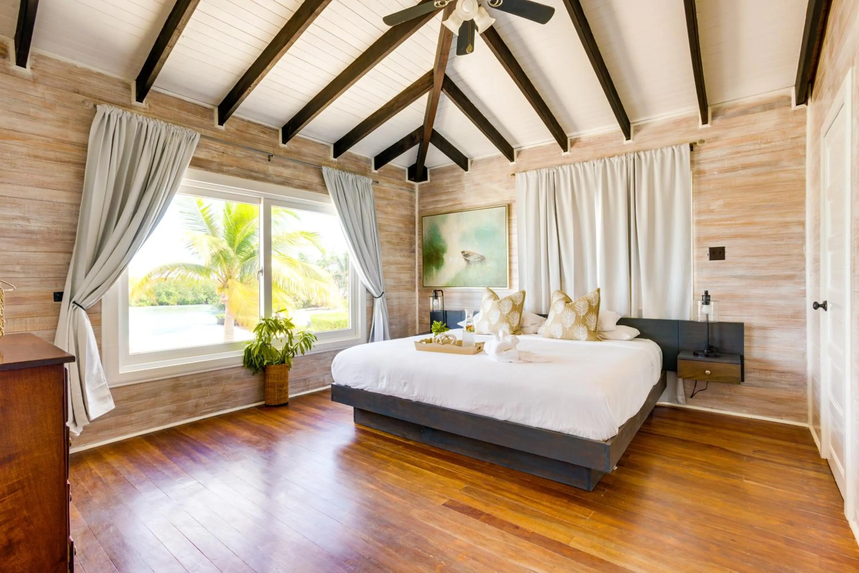 Bed in Shaka Caye All inclusive Resort