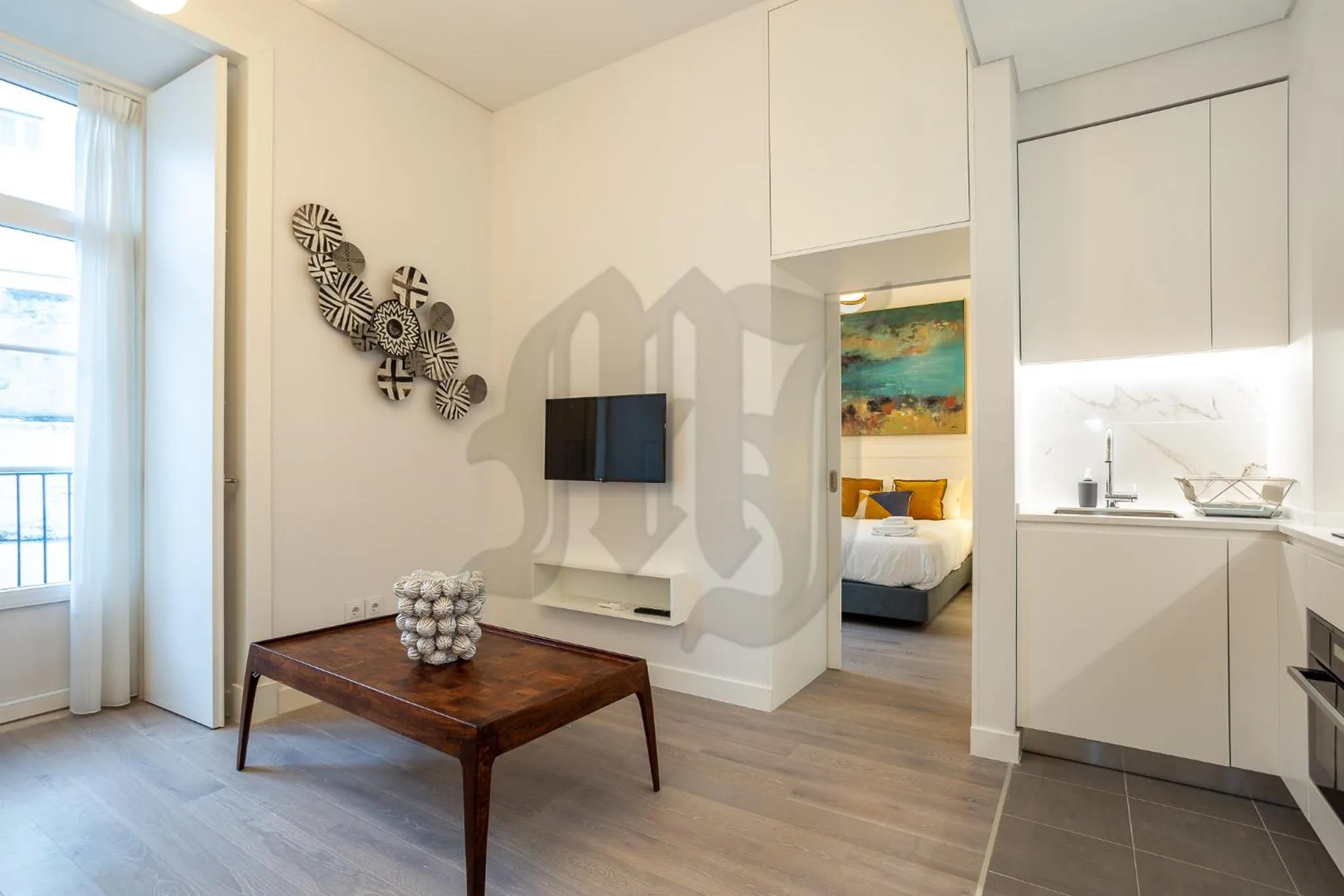 TV and multimedia, Bed in Morgan-Jupiter Apartments