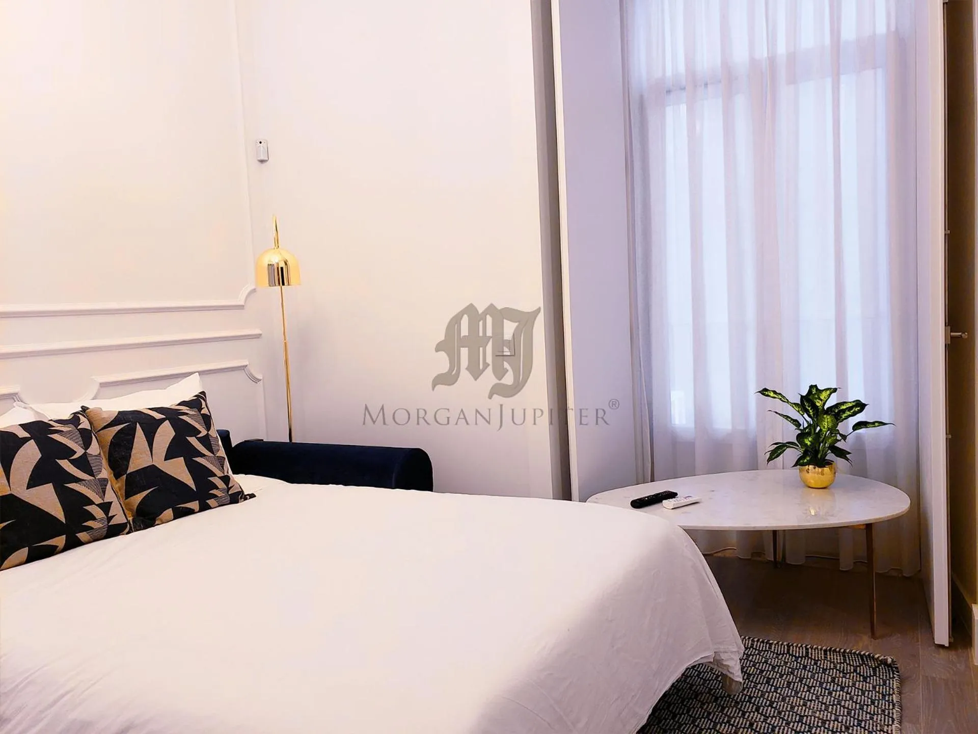 Living room, Bed in Morgan-Jupiter Apartments