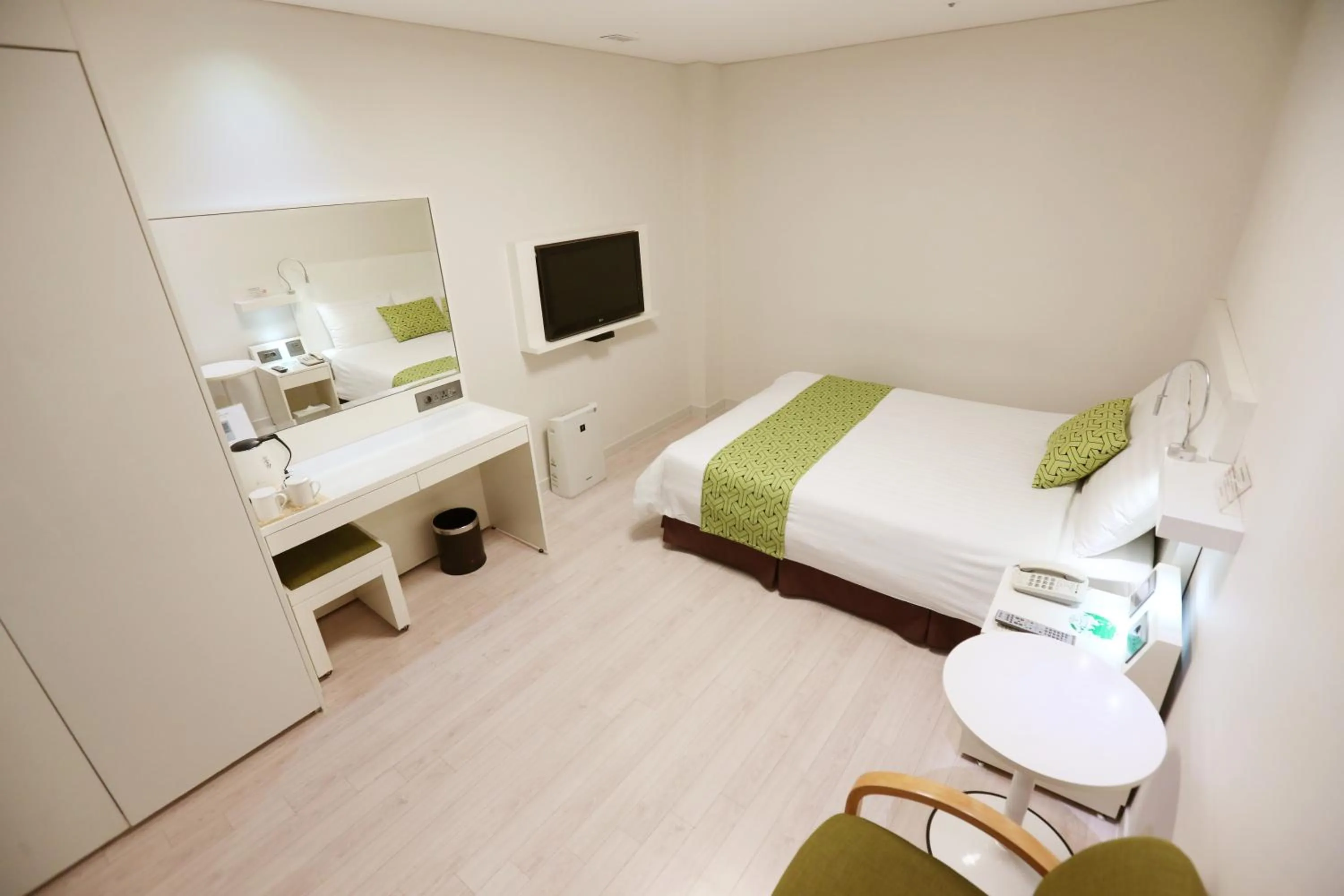 Bed in New Kukje Hotel