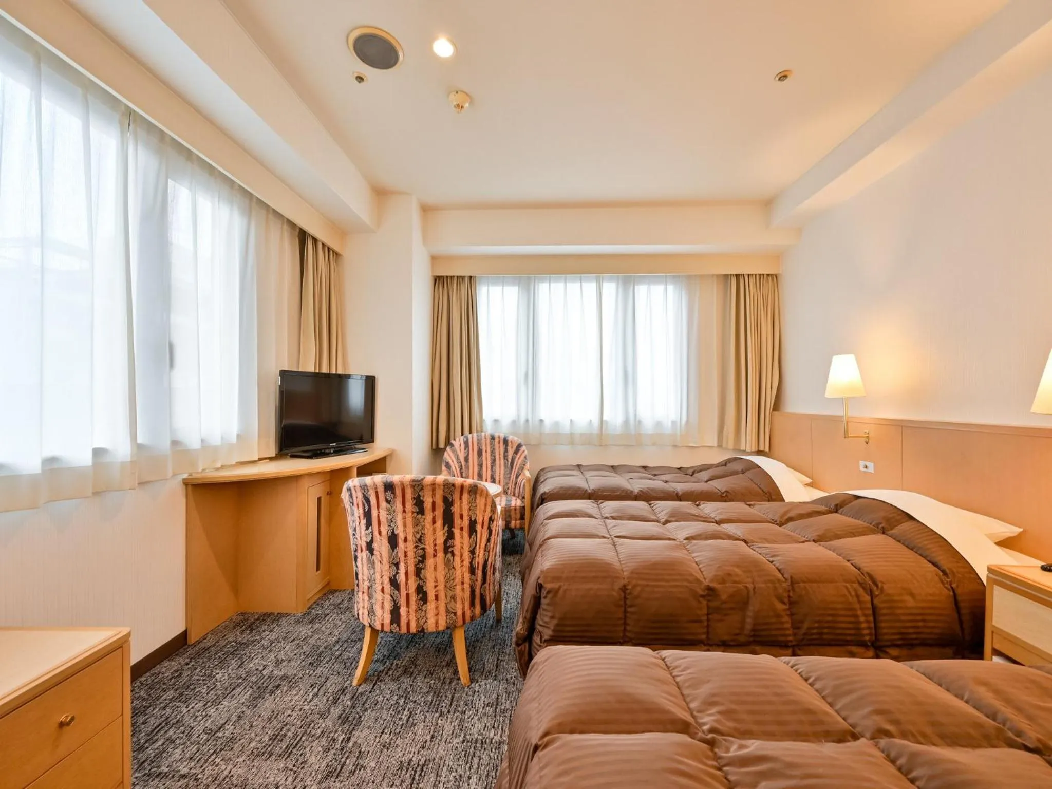 Bed in Hotel Sun Valley Annex