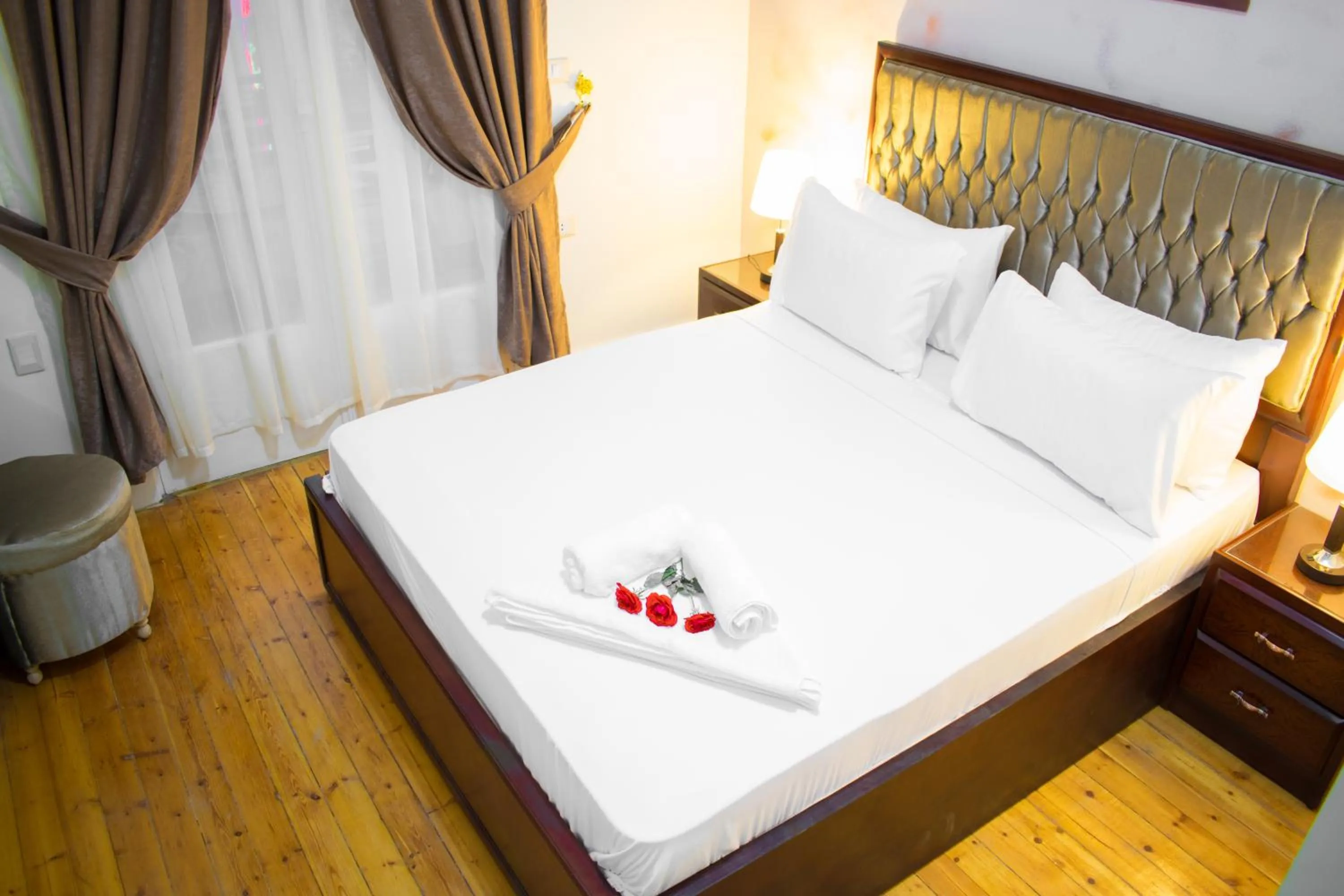 Bed in Golden Palace Hotel