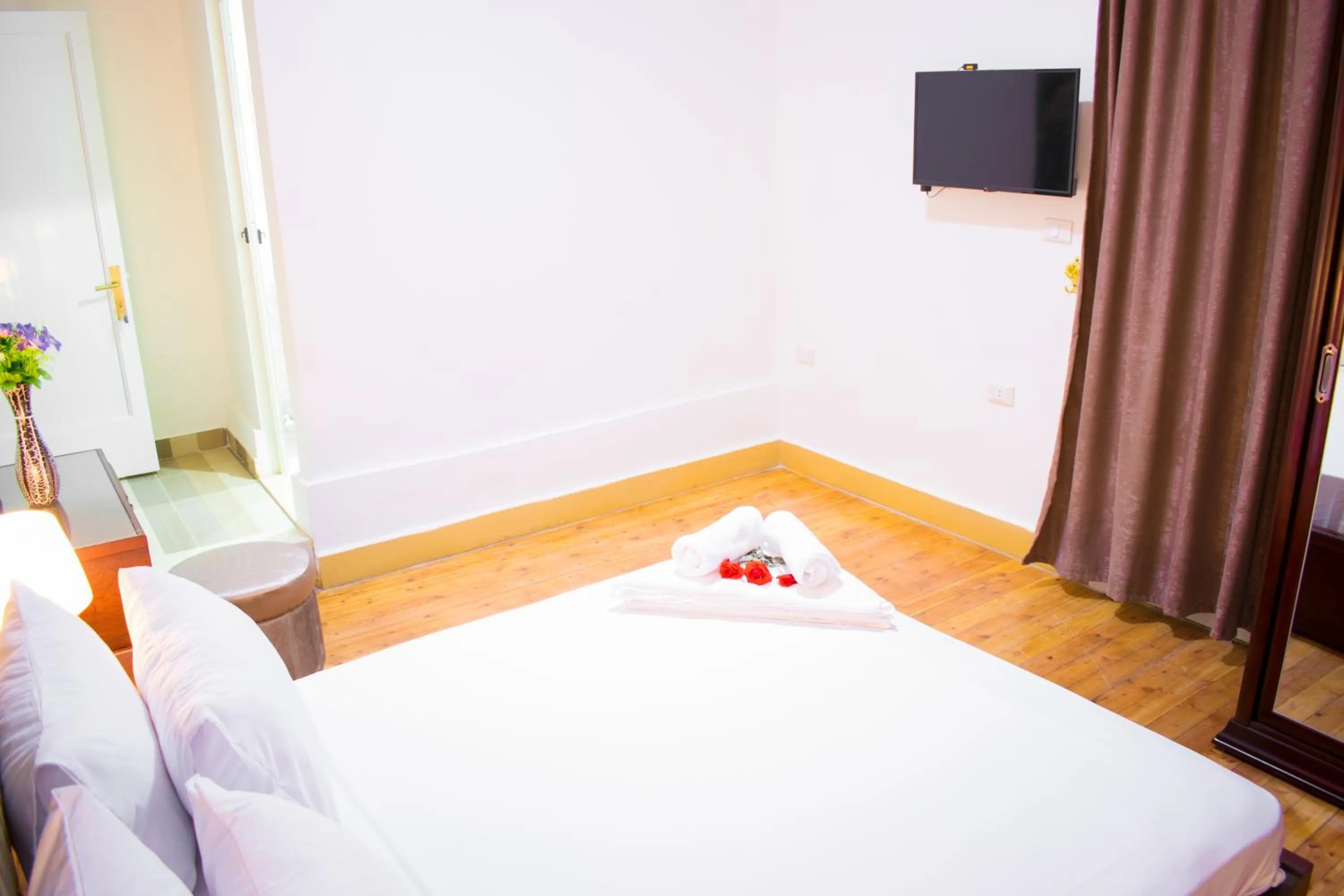 Bed in Golden Palace Hotel