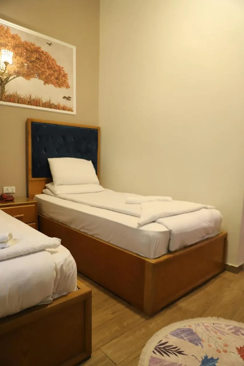 Bed in Golden Palace Hotel