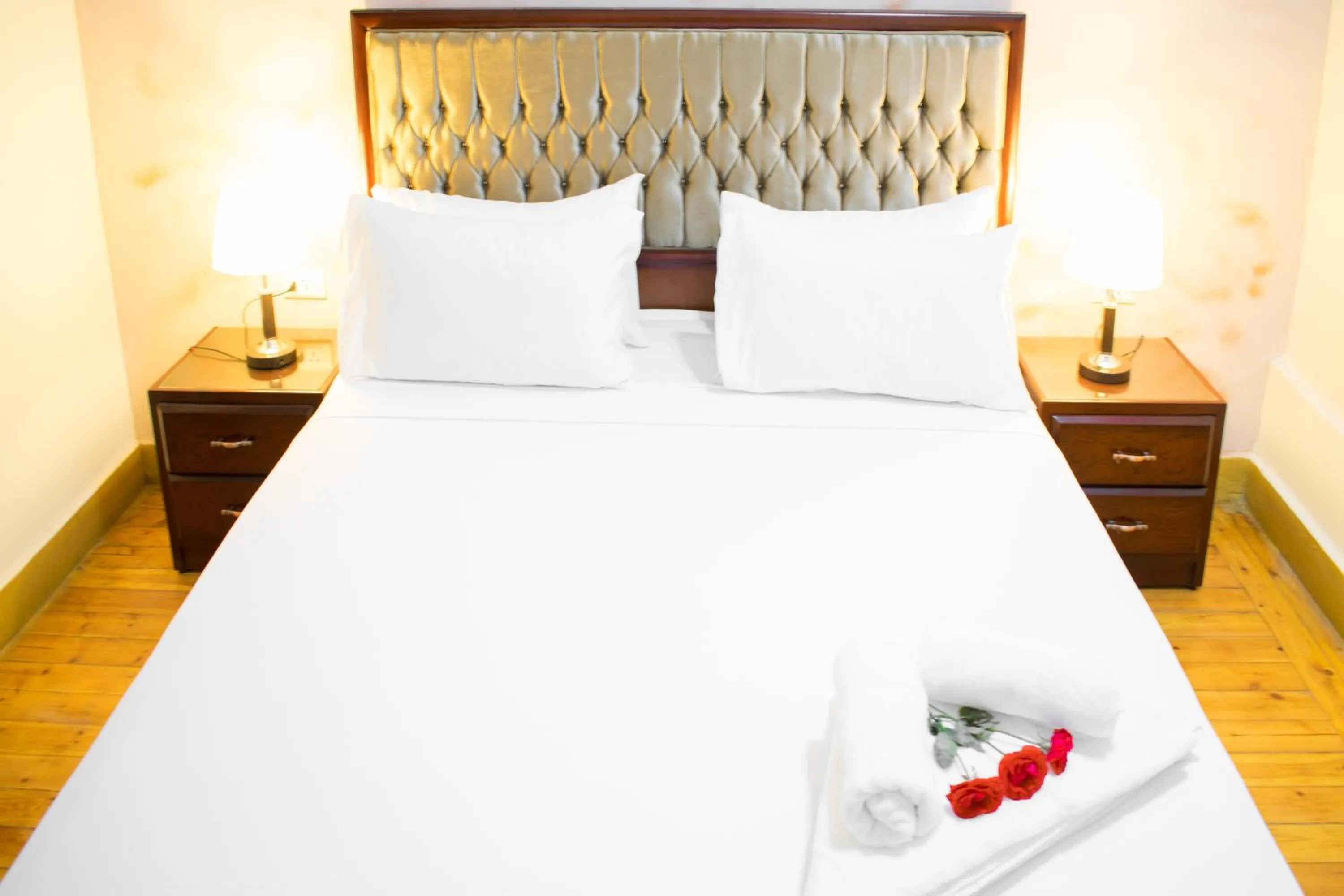 Bed in Golden Palace Hotel