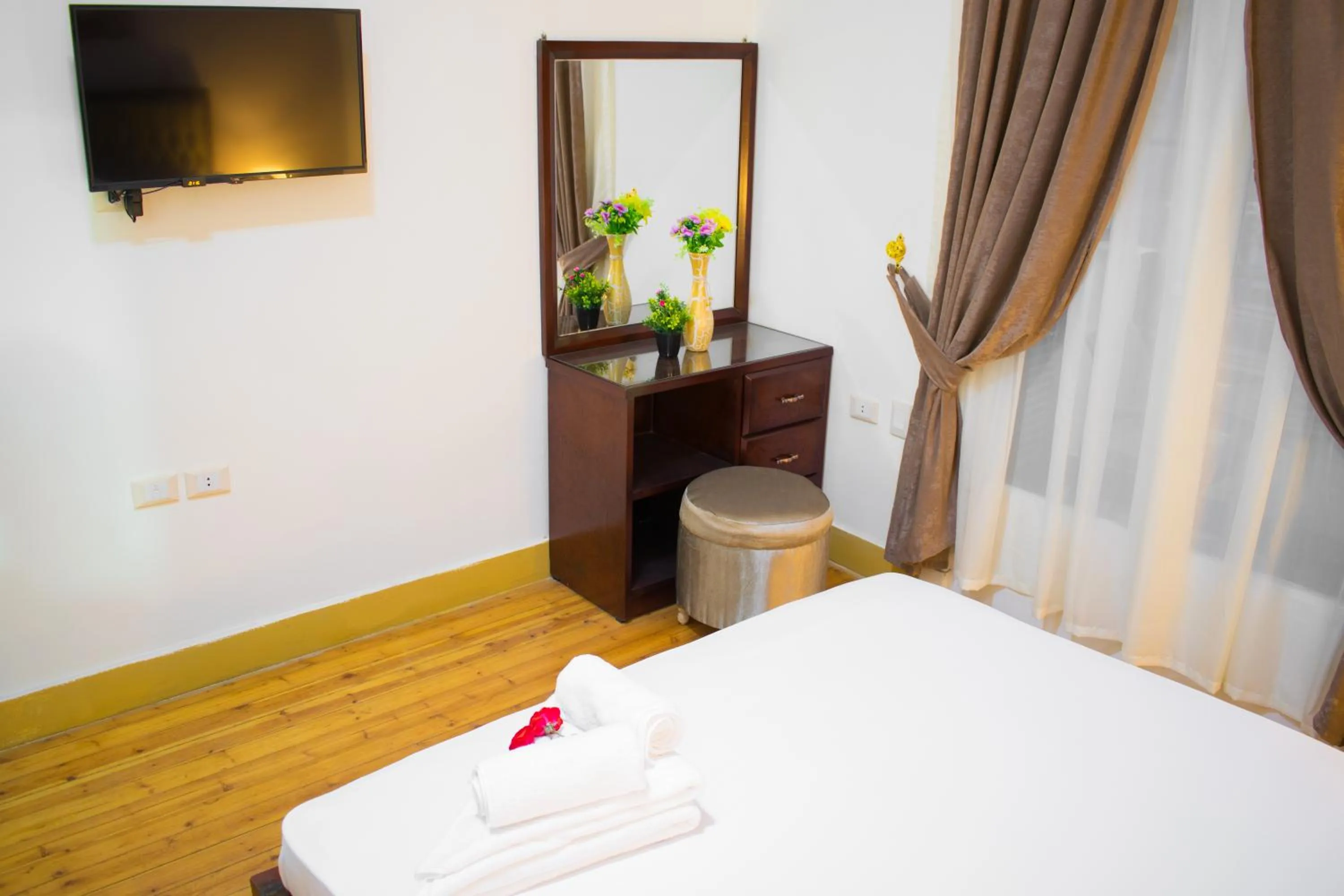 Bed in Golden Palace Hotel