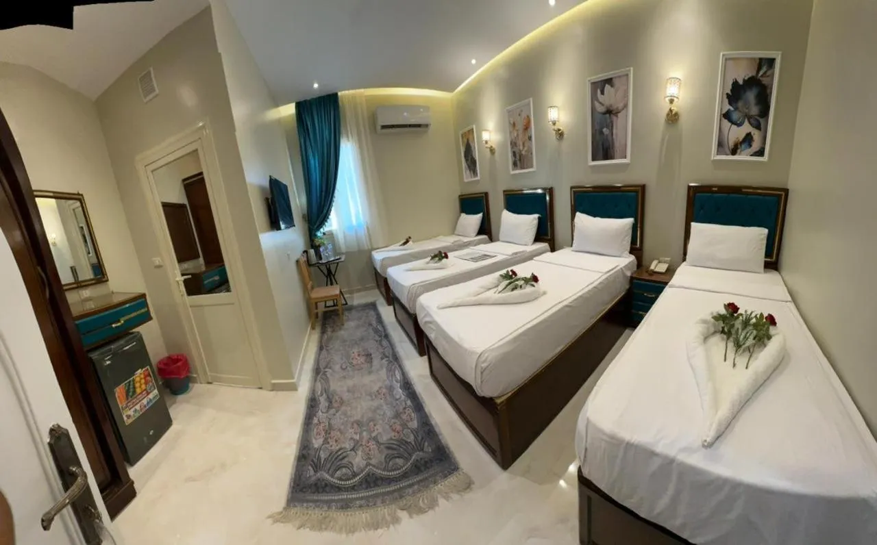 Bed in Golden Palace Hotel