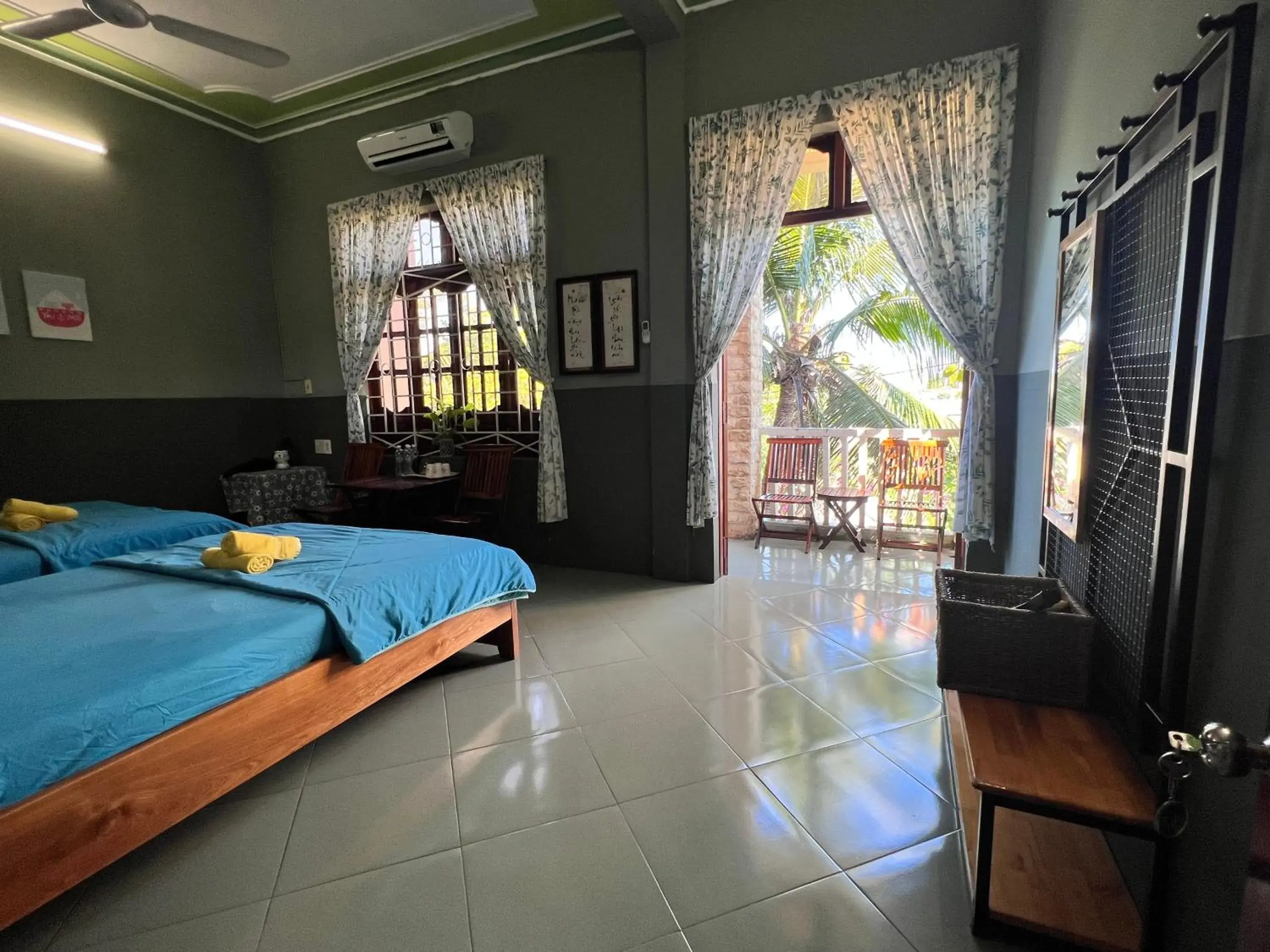 Quadruple Room with Balcony in Yellow Farm Homestay at Tuy Hòa Phú Yên Quadruple Room with Balcony in Yellow Farm Homestay at Tuy Hòa Phú Yên