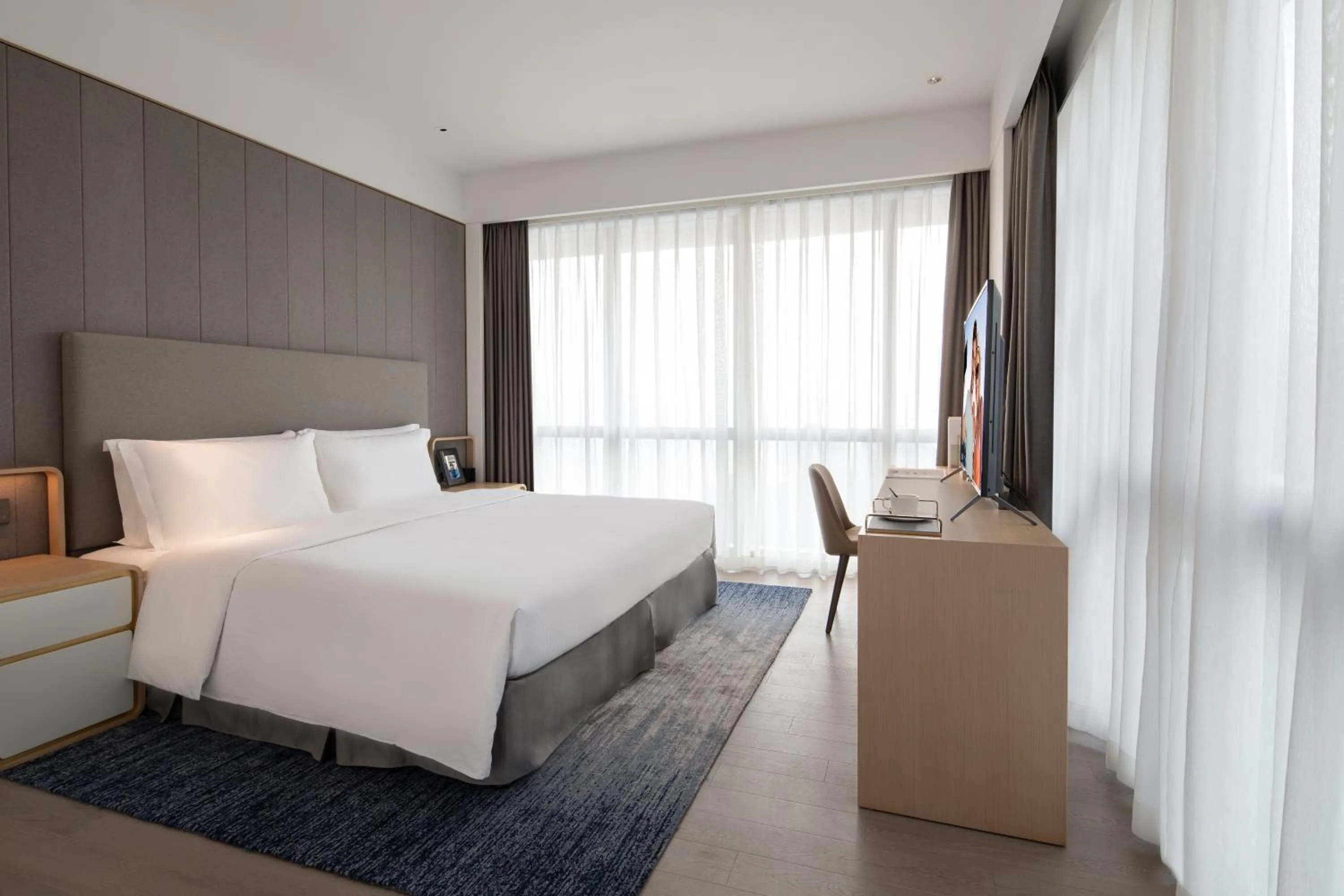 Bed in Ascott Raffles City Chongqing