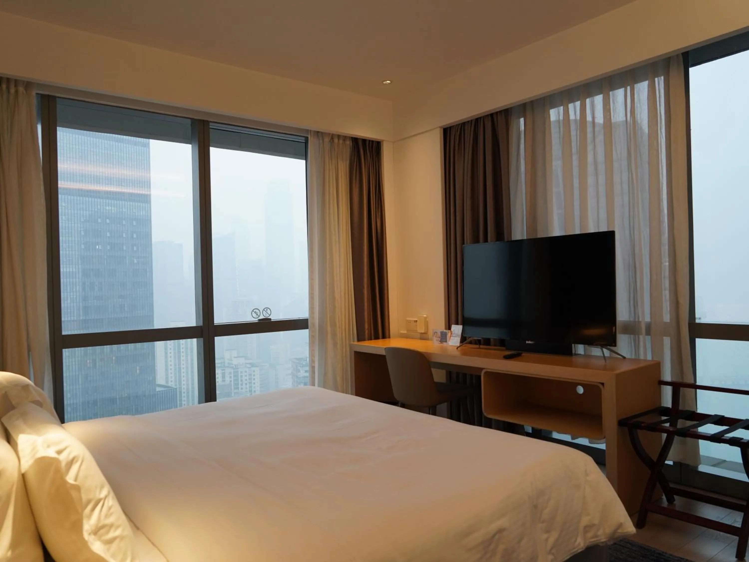 Bed in Ascott Raffles City Chongqing