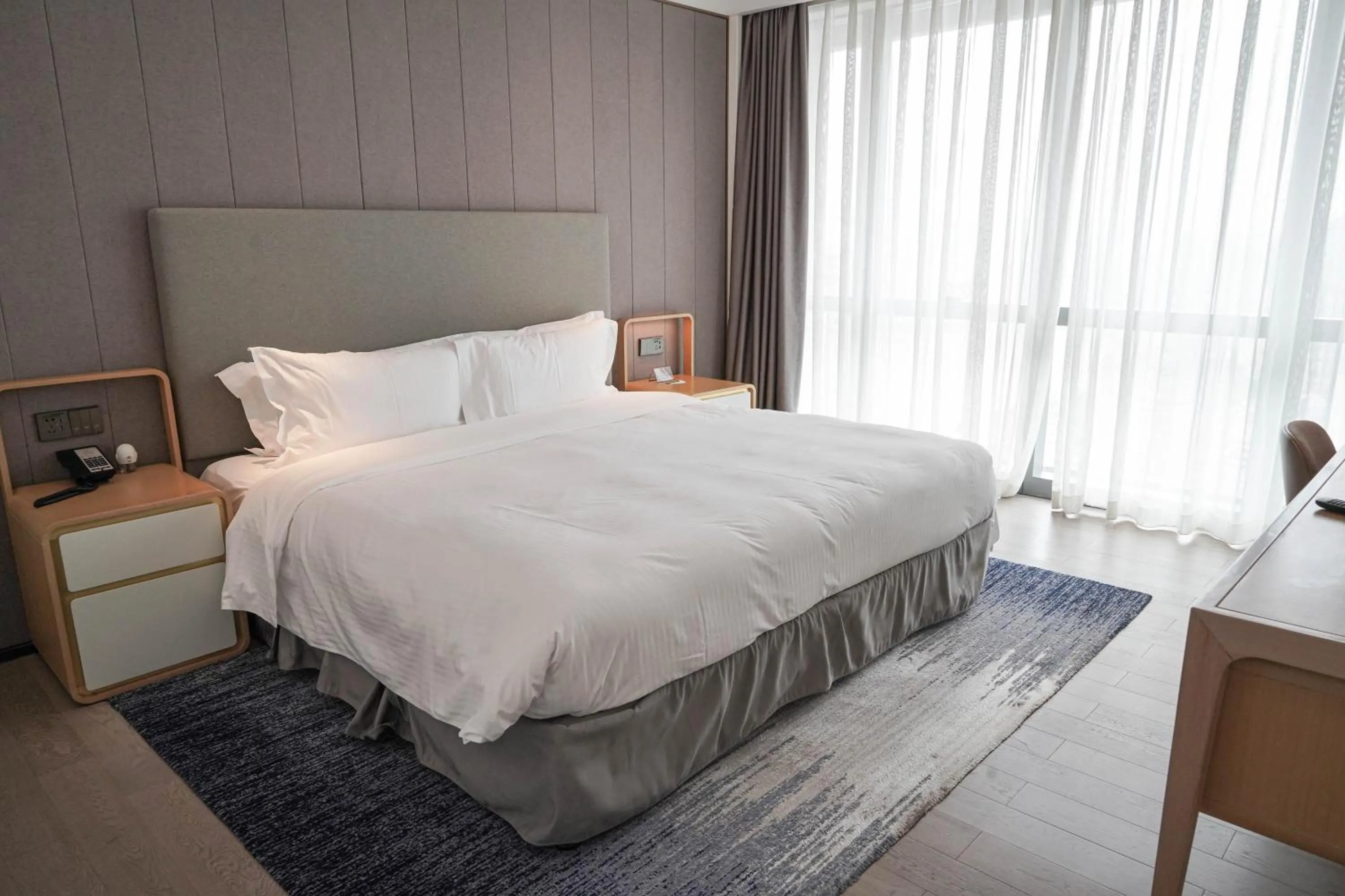 Bed in Ascott Raffles City Chongqing