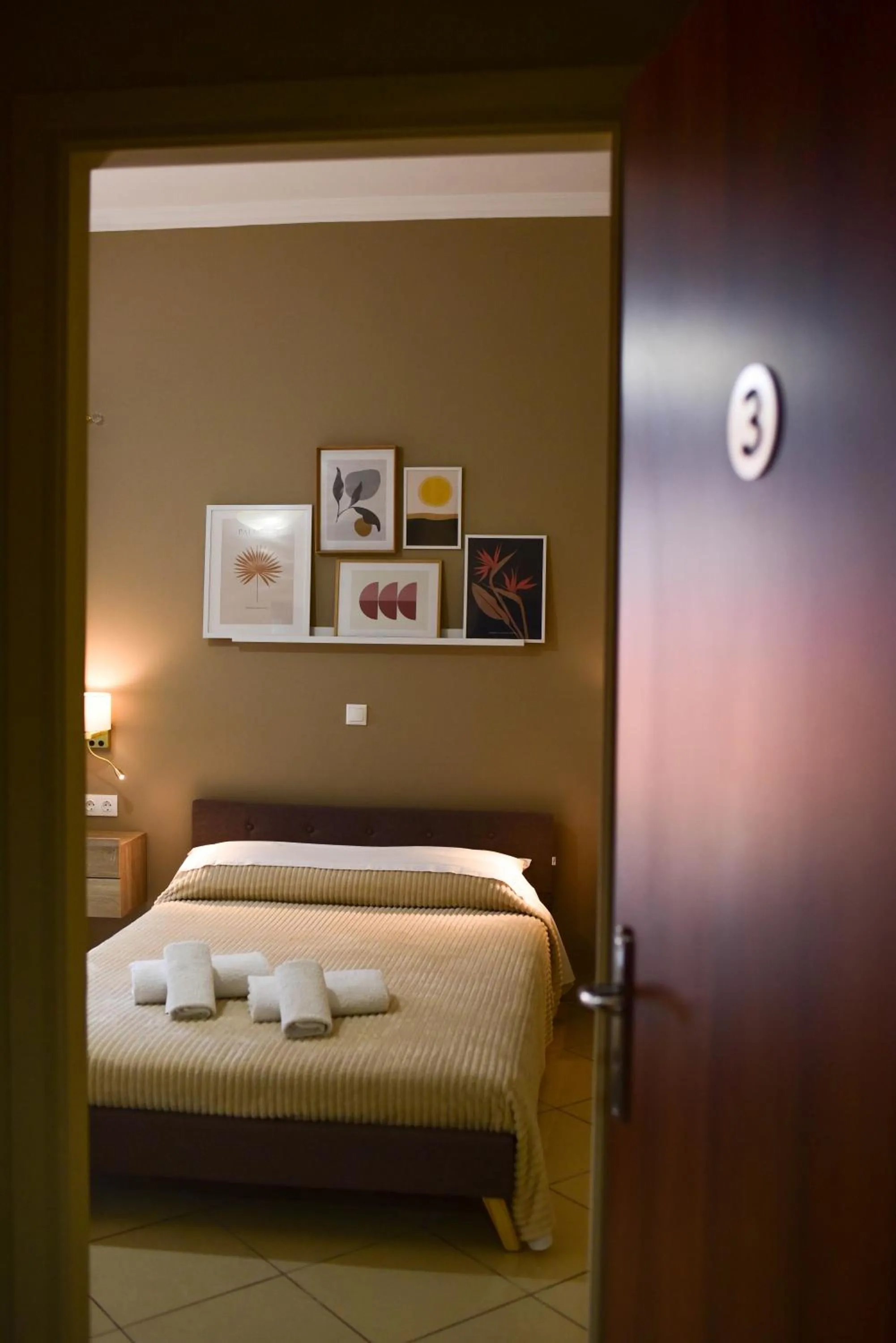 Bed in Vasilios Marinos Rooms