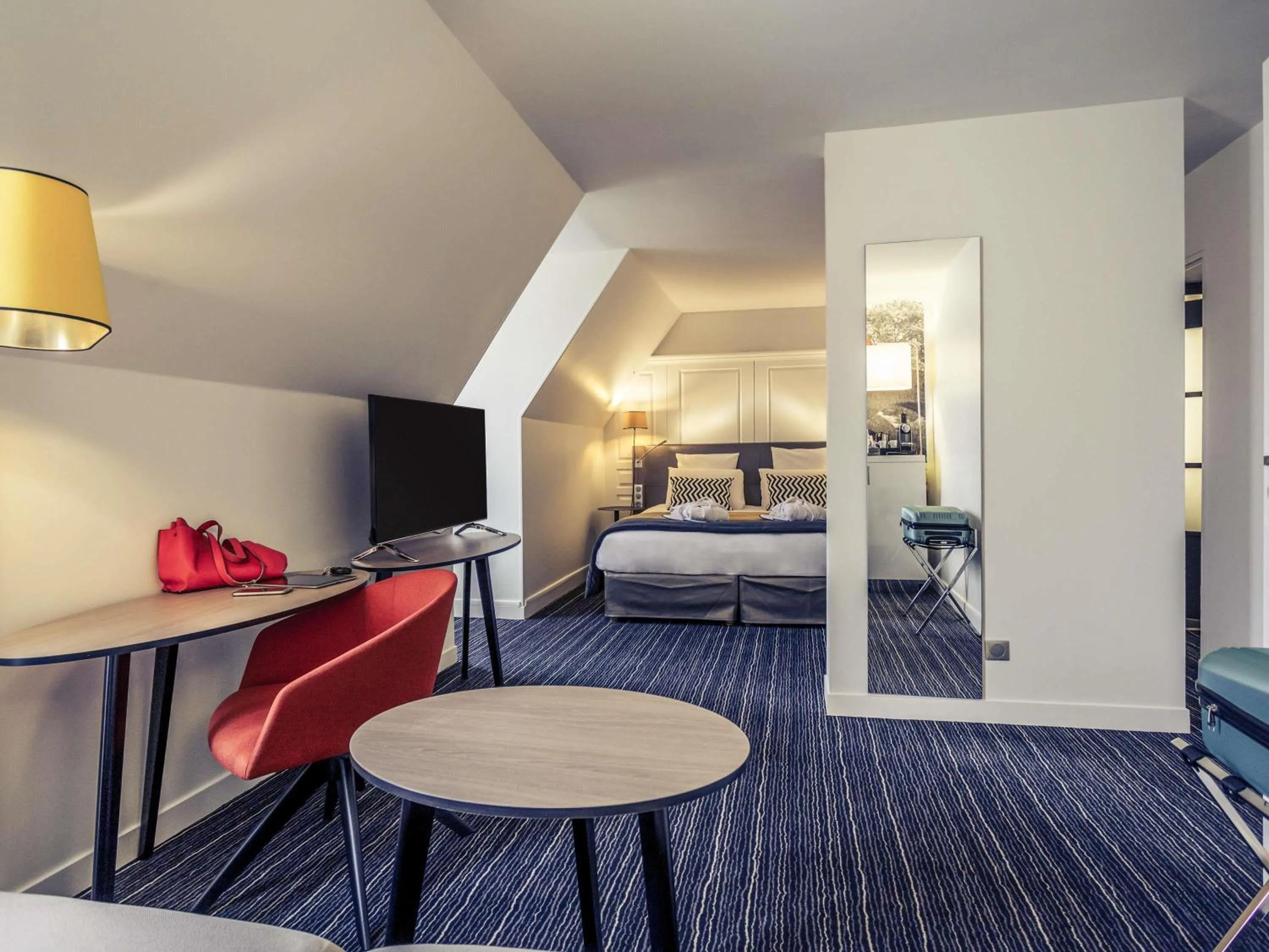 Photo of the whole room, Bed in Hotel De Bourbon Grand Hotel Mercure Bourges