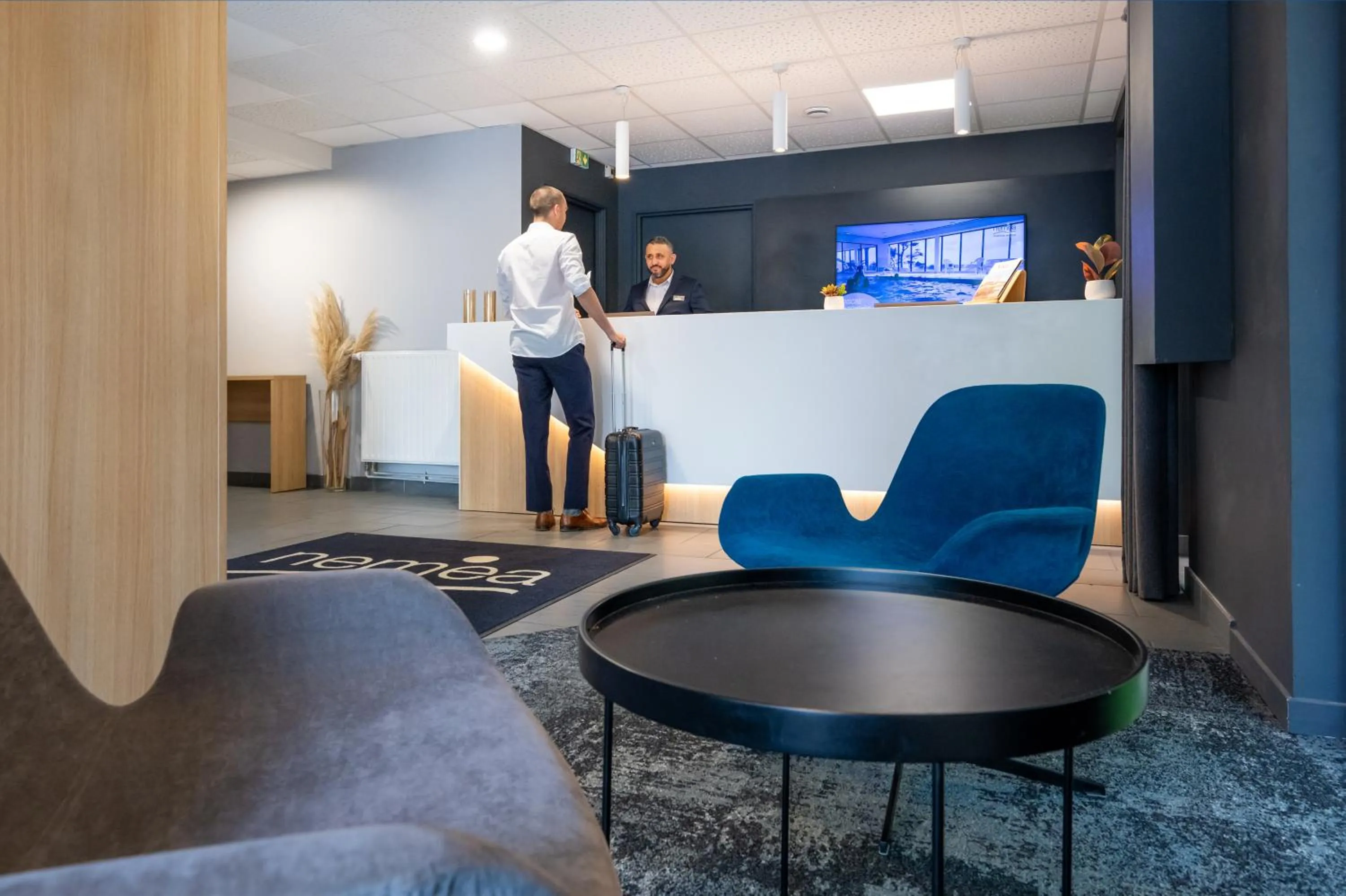 Lobby or reception in Nemea Appart Hotel Grand Cœur Nancy Centre