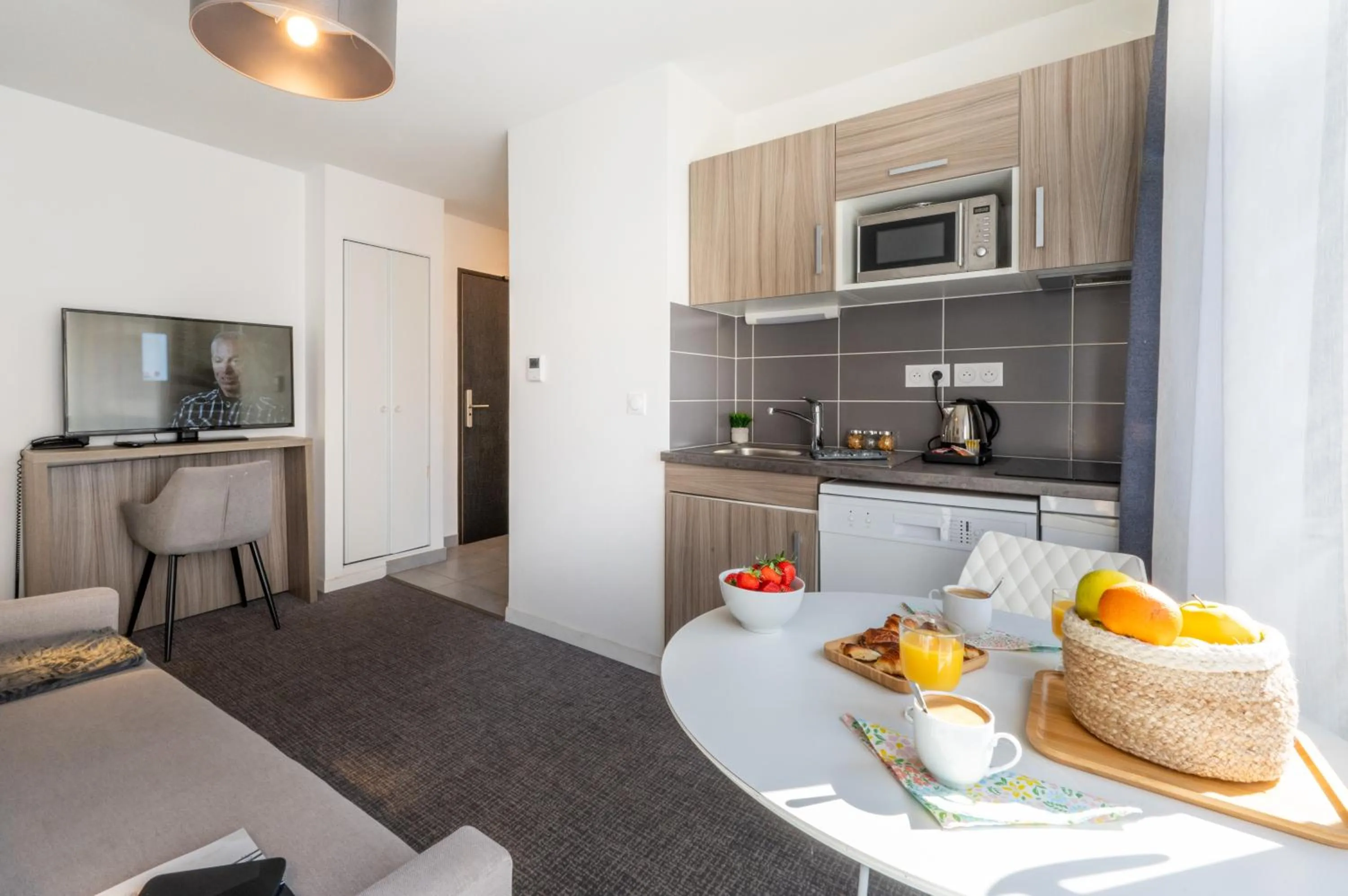 Seating area in Nemea Appart Hotel Grand Cœur Nancy Centre