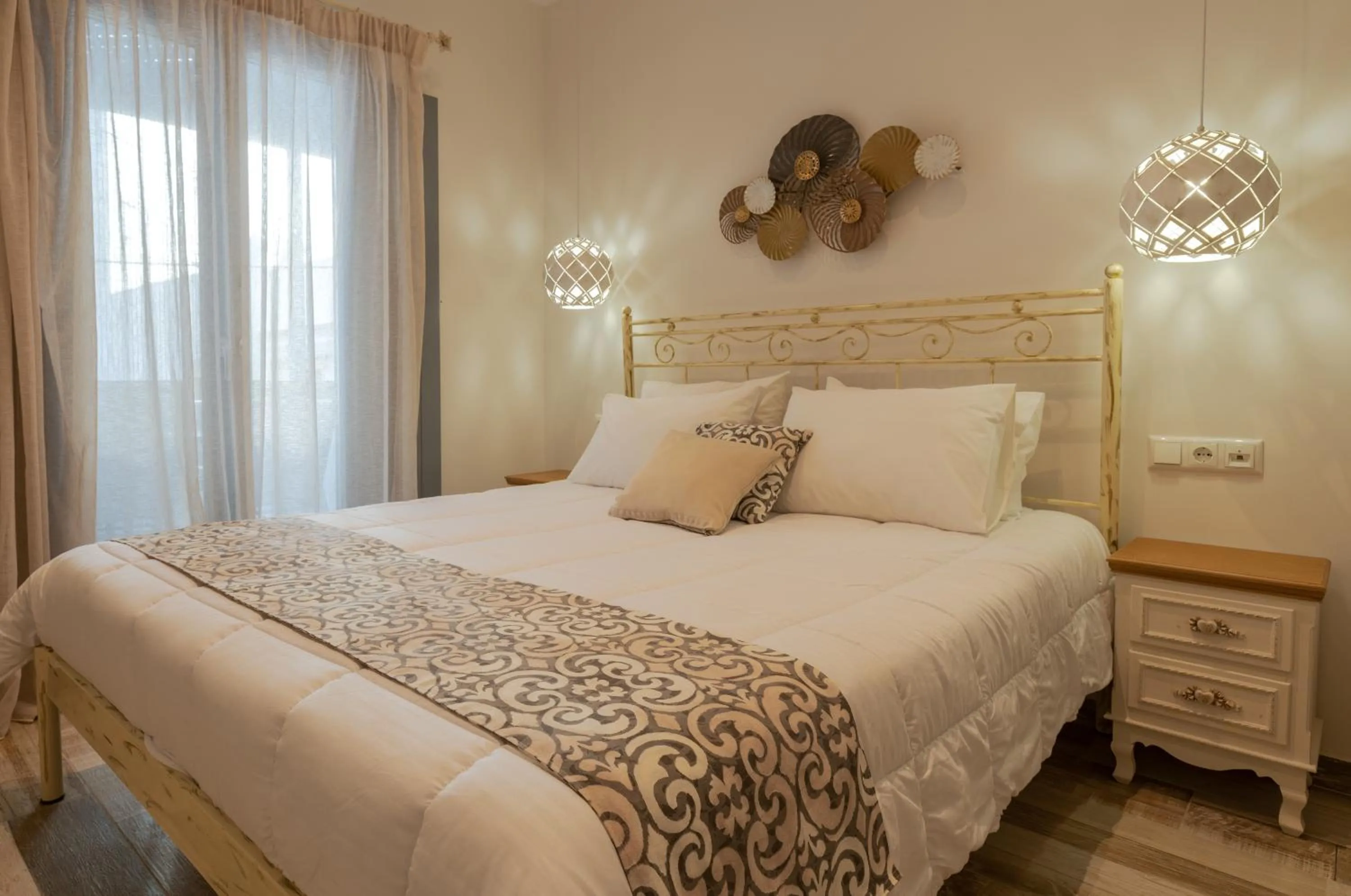 Bed in Naxos Enjoy Apartments