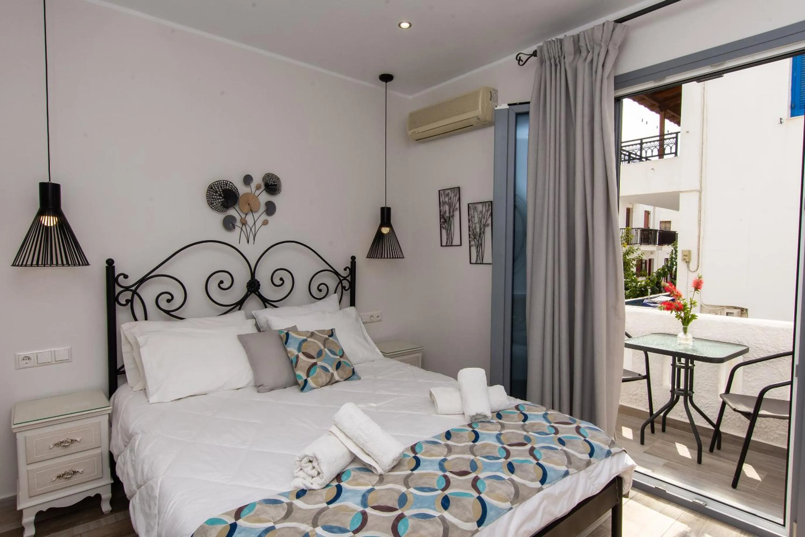 Bed in Naxos Enjoy Apartments