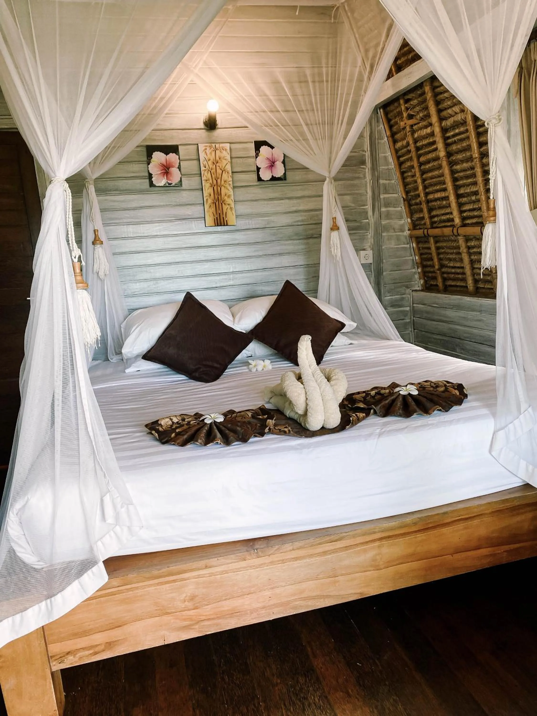 Bed in Abian Huts Dream Beach Lembongan