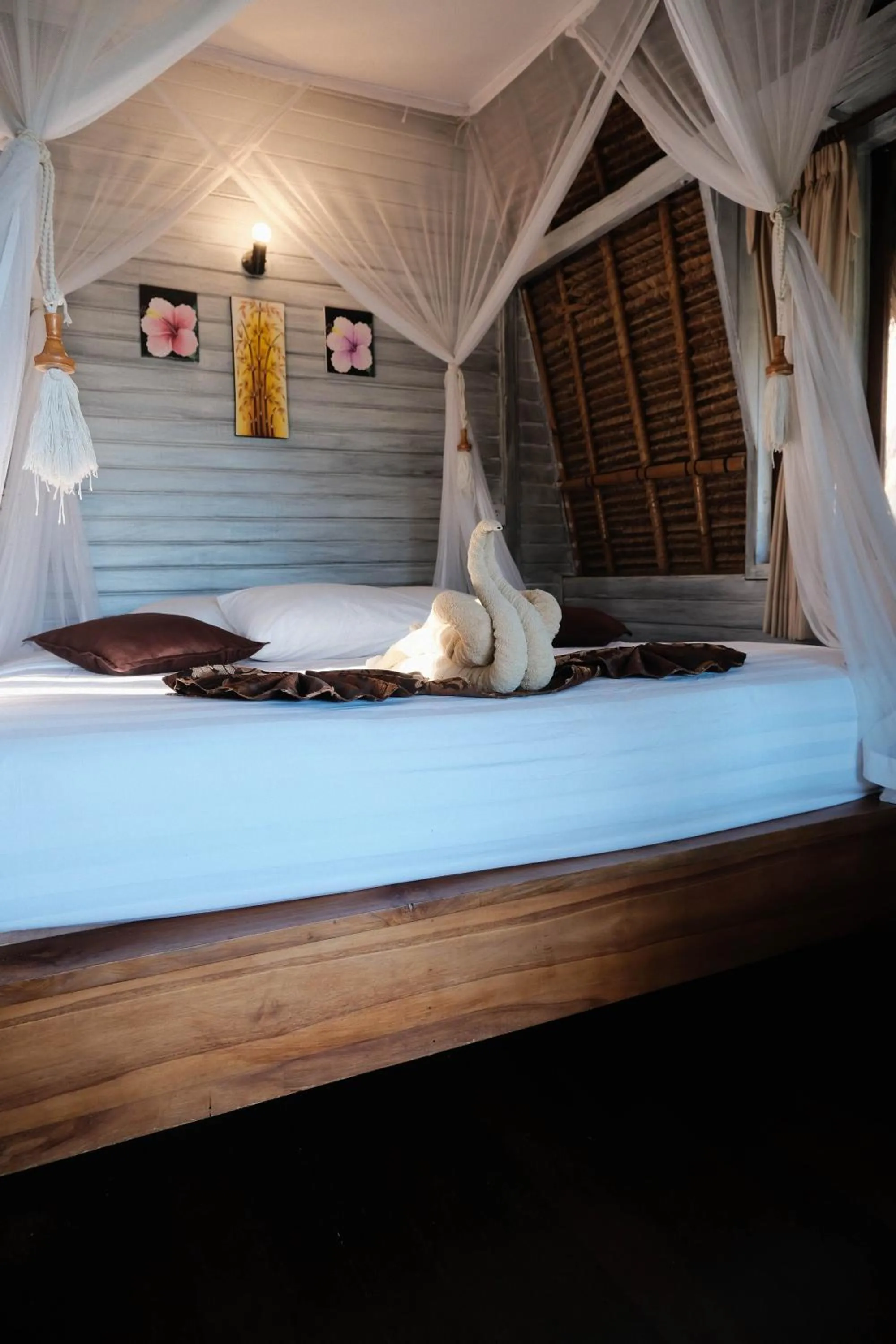 Bed in Abian Huts Dream Beach Lembongan