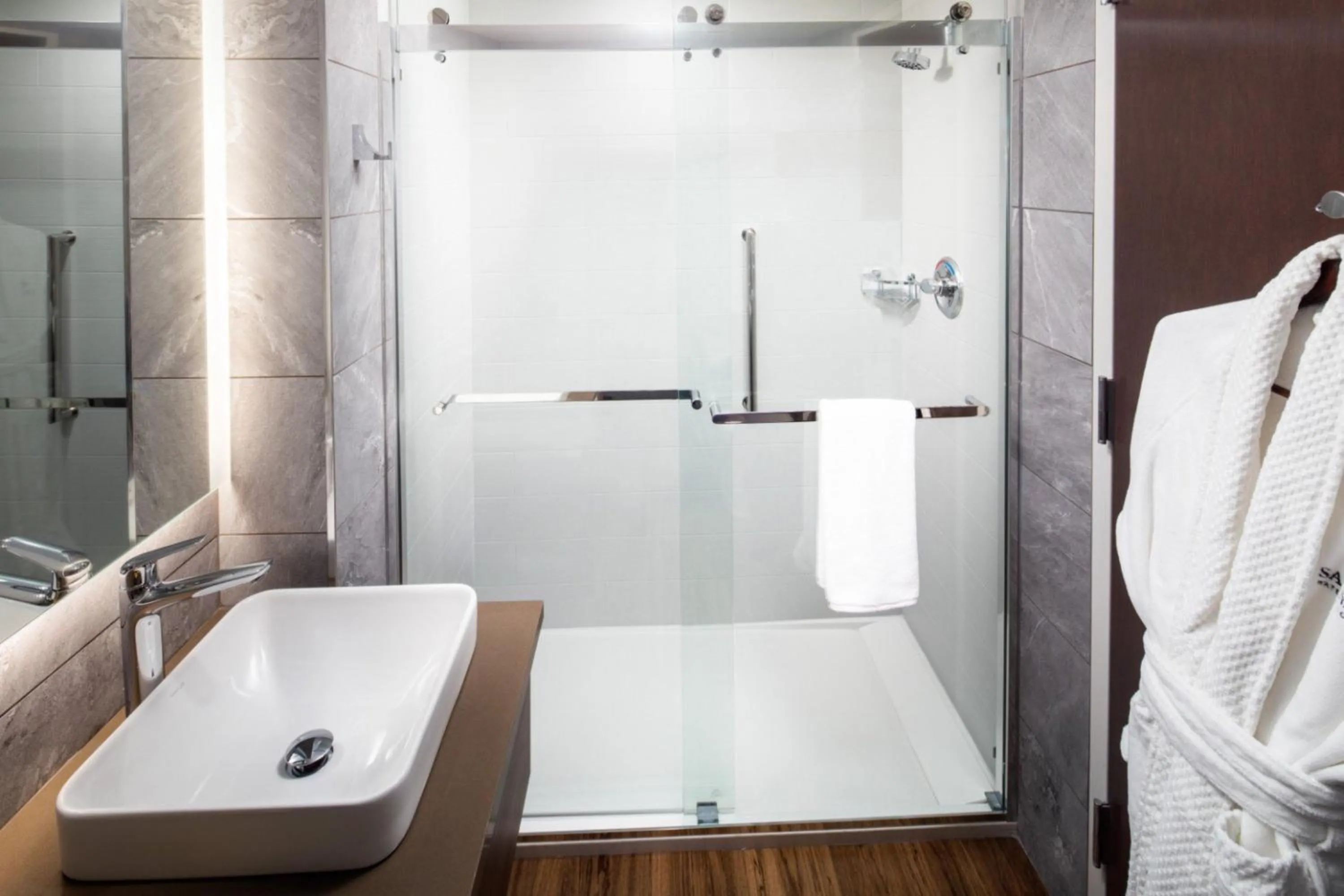 Bathroom in voco Saranac Lake NY - Waterfront by IHG