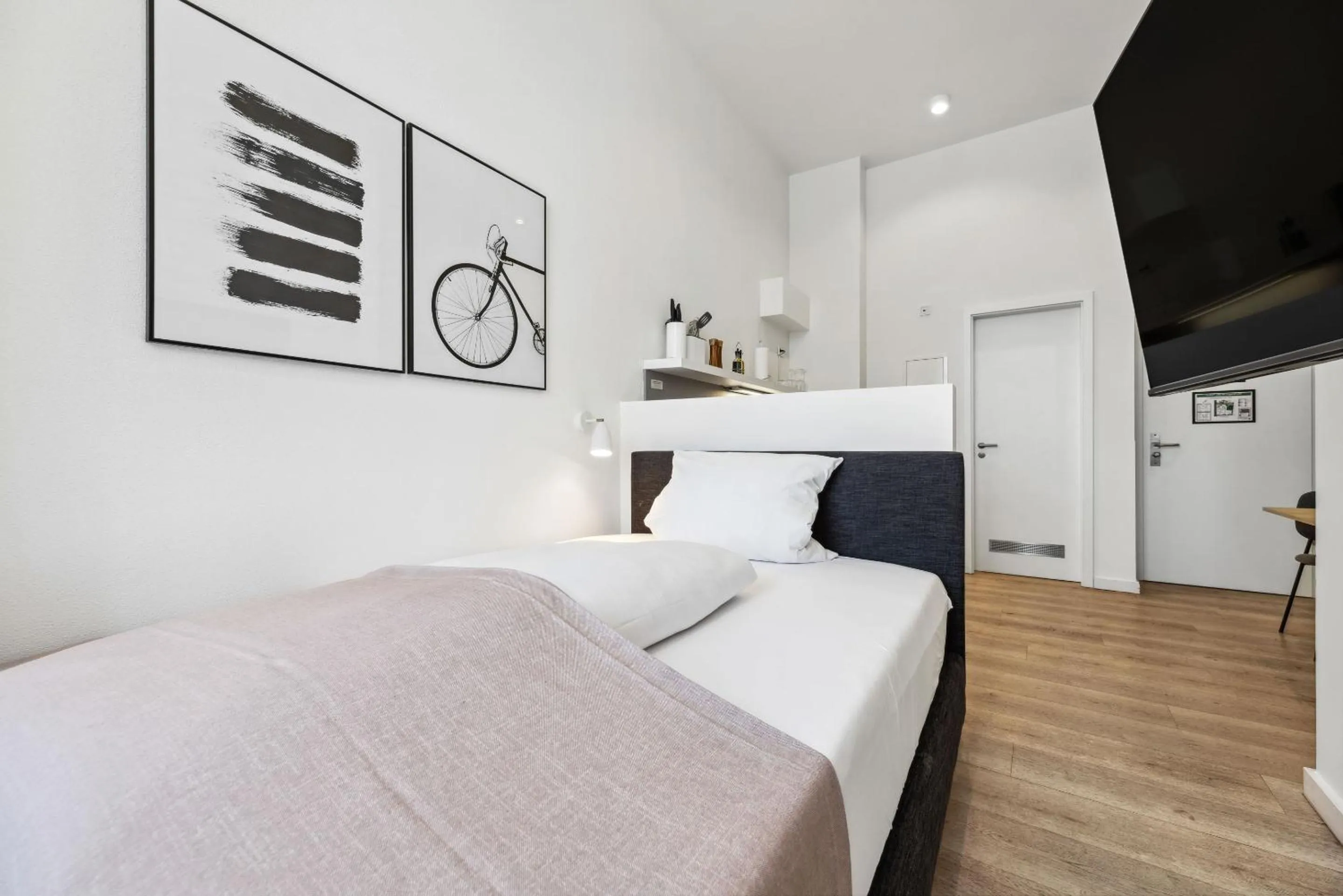 Bed in Limehome Bamberg Maximiliansplatz